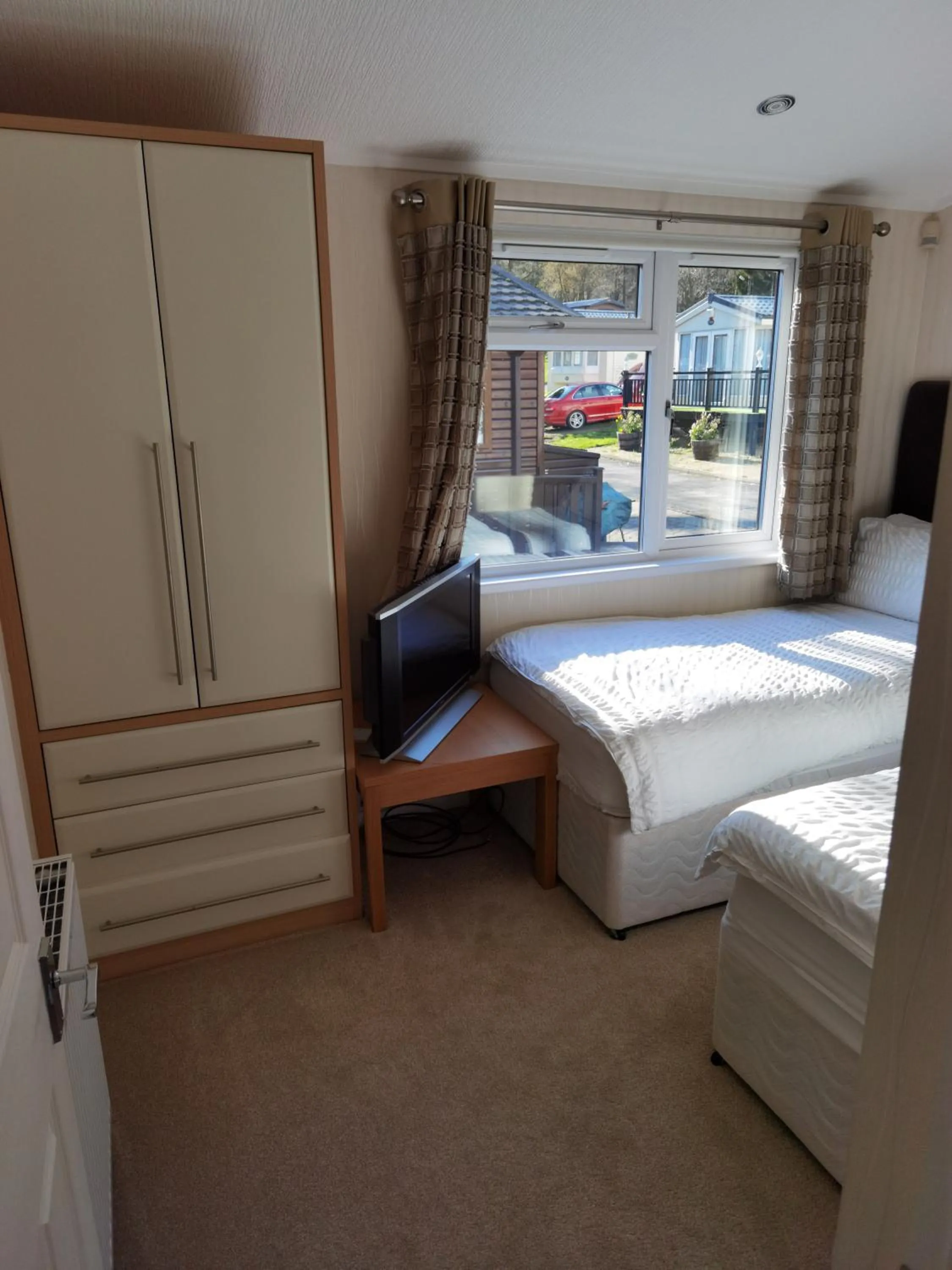Bed in Bonnie Banks Lodge Ardlui