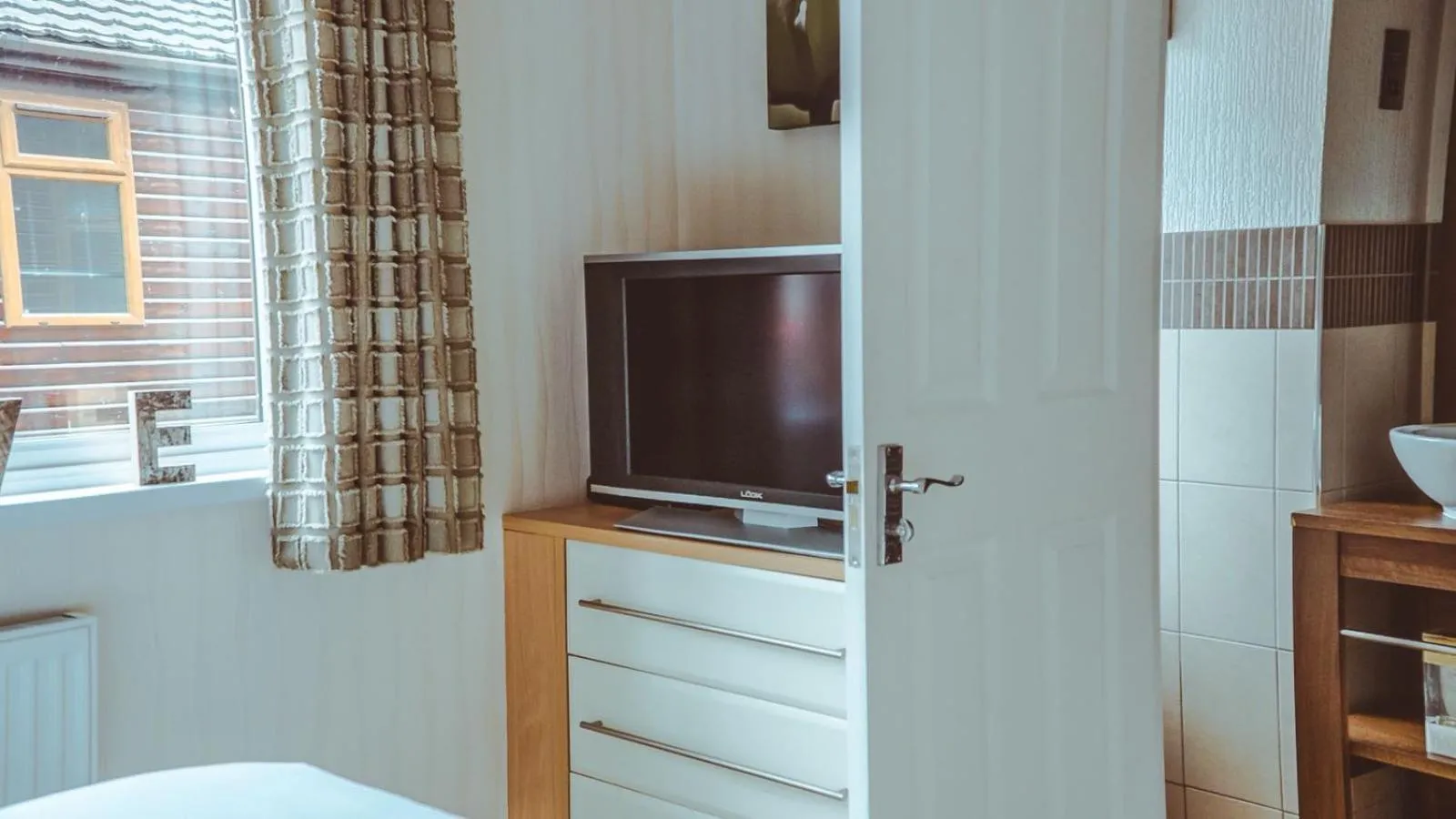 Bed in Bonnie Banks Lodge Ardlui