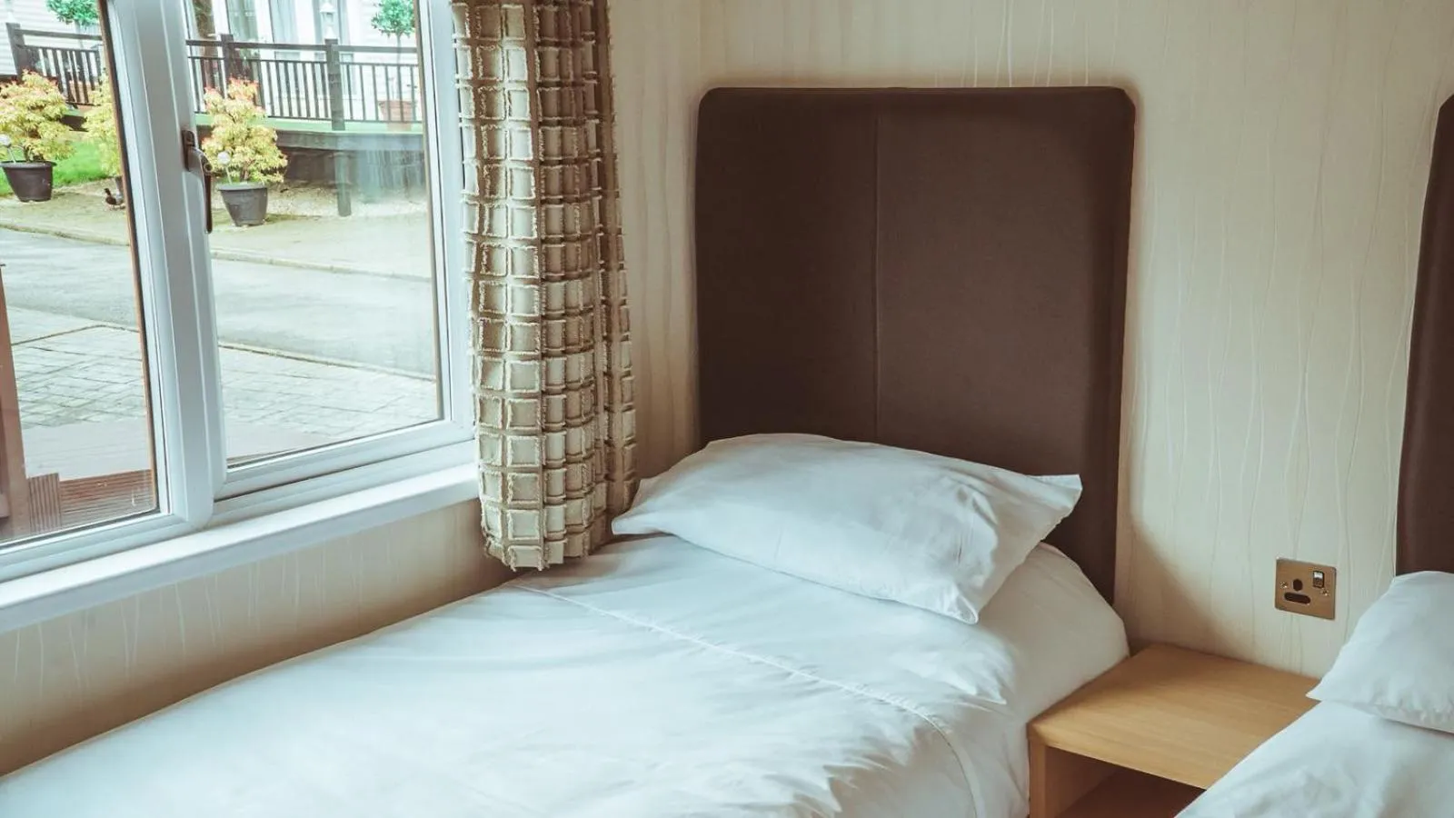 Bed in Bonnie Banks Lodge Ardlui