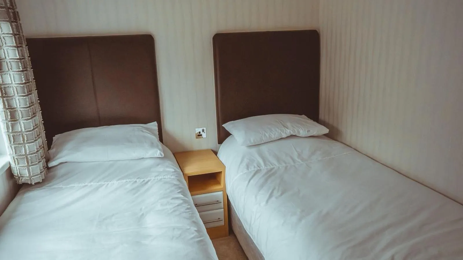 Bed in Bonnie Banks Lodge Ardlui