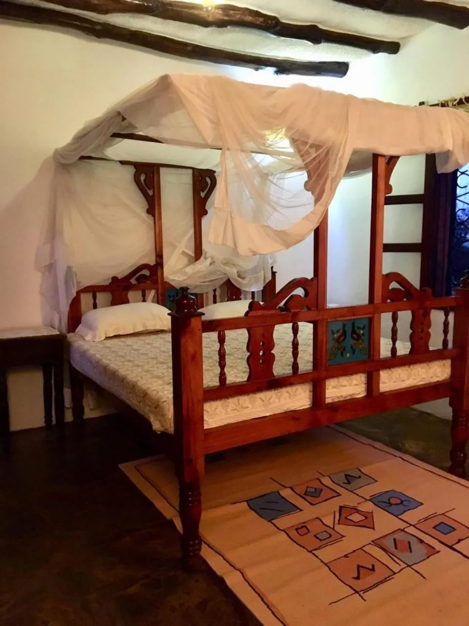 Bed in Boutique Hotel Nyumbani Tembo