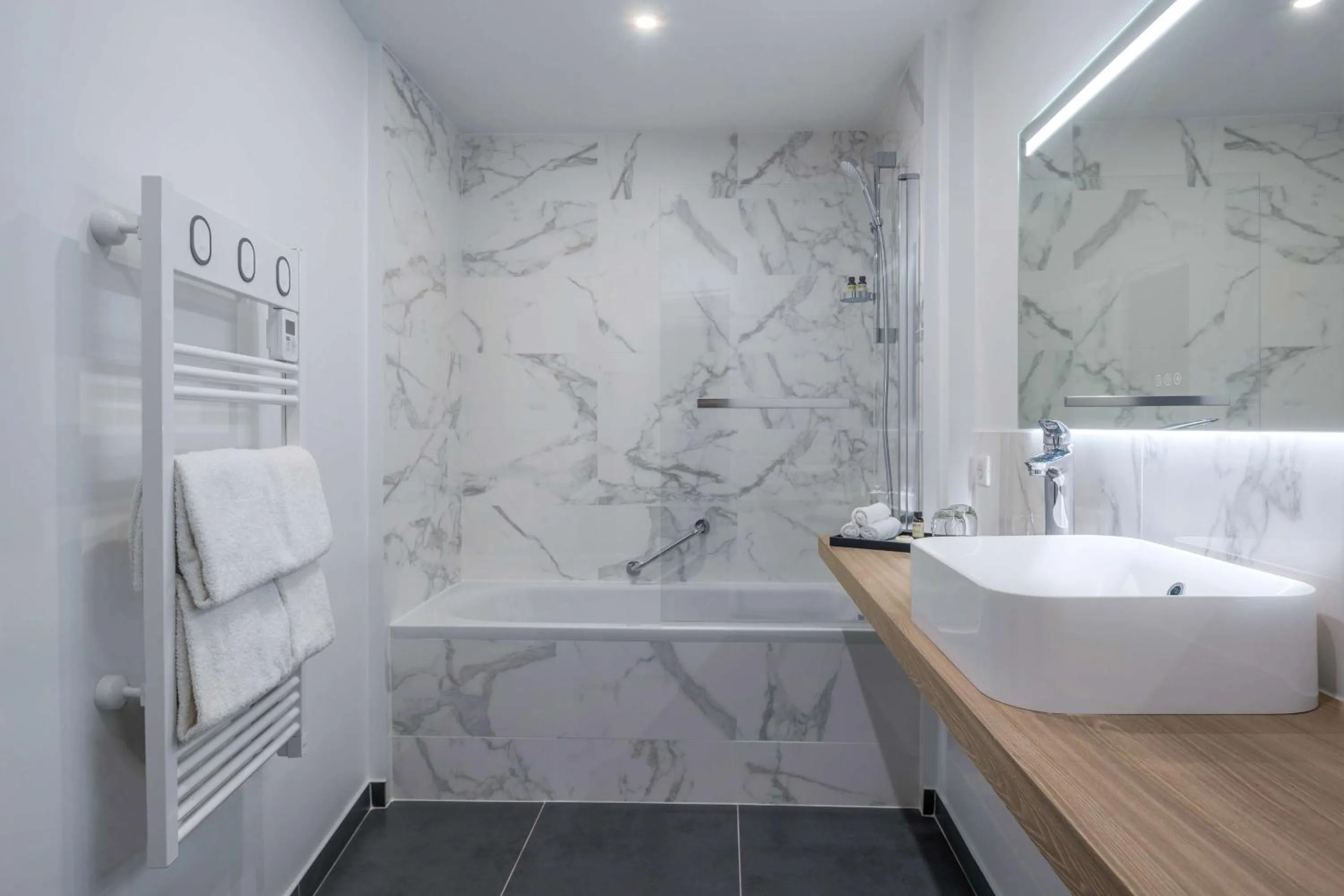 Bathroom in Hotel Camille Paris Tapestry Collection by Hilton