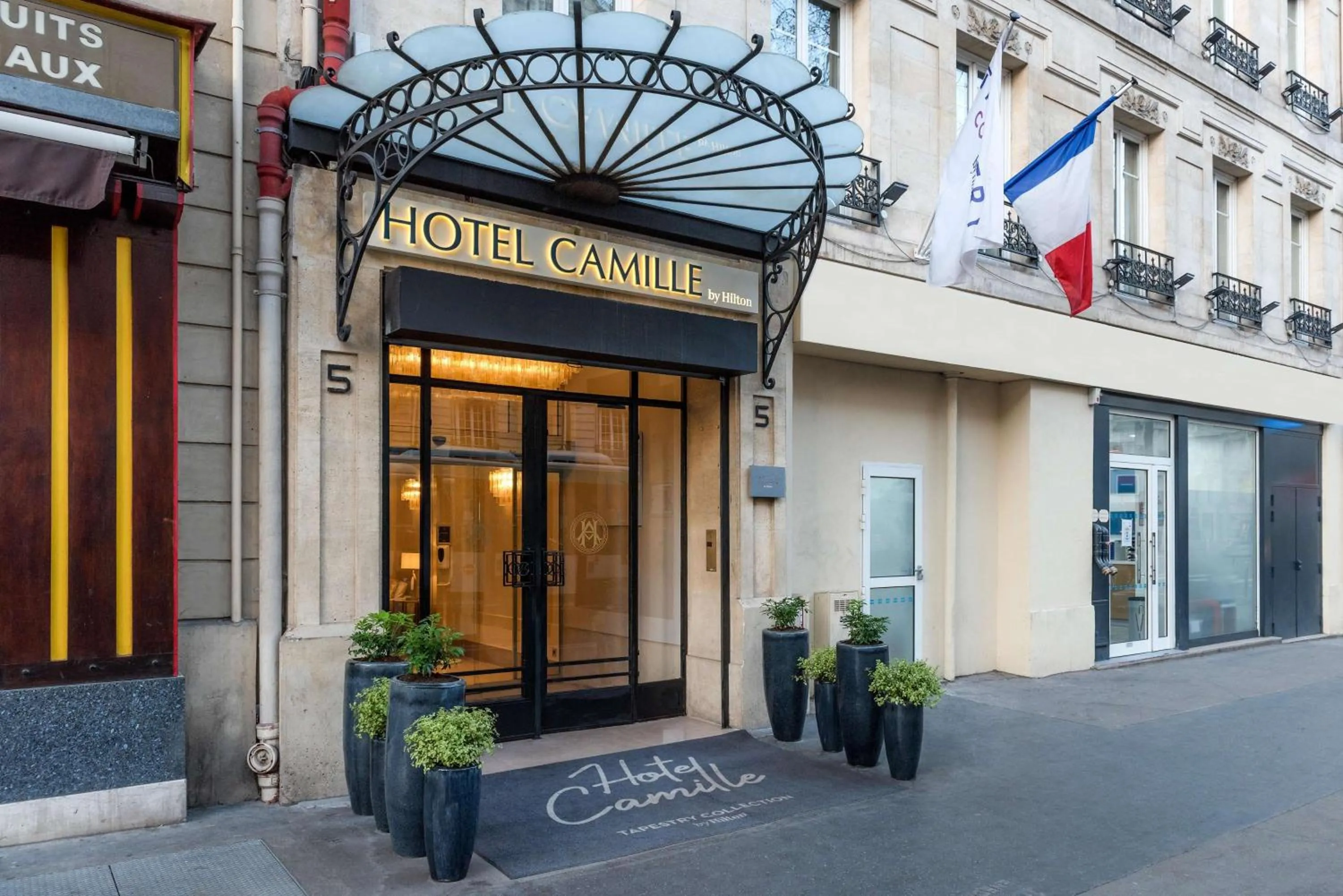 Property building in Hotel Camille Paris Tapestry Collection by Hilton