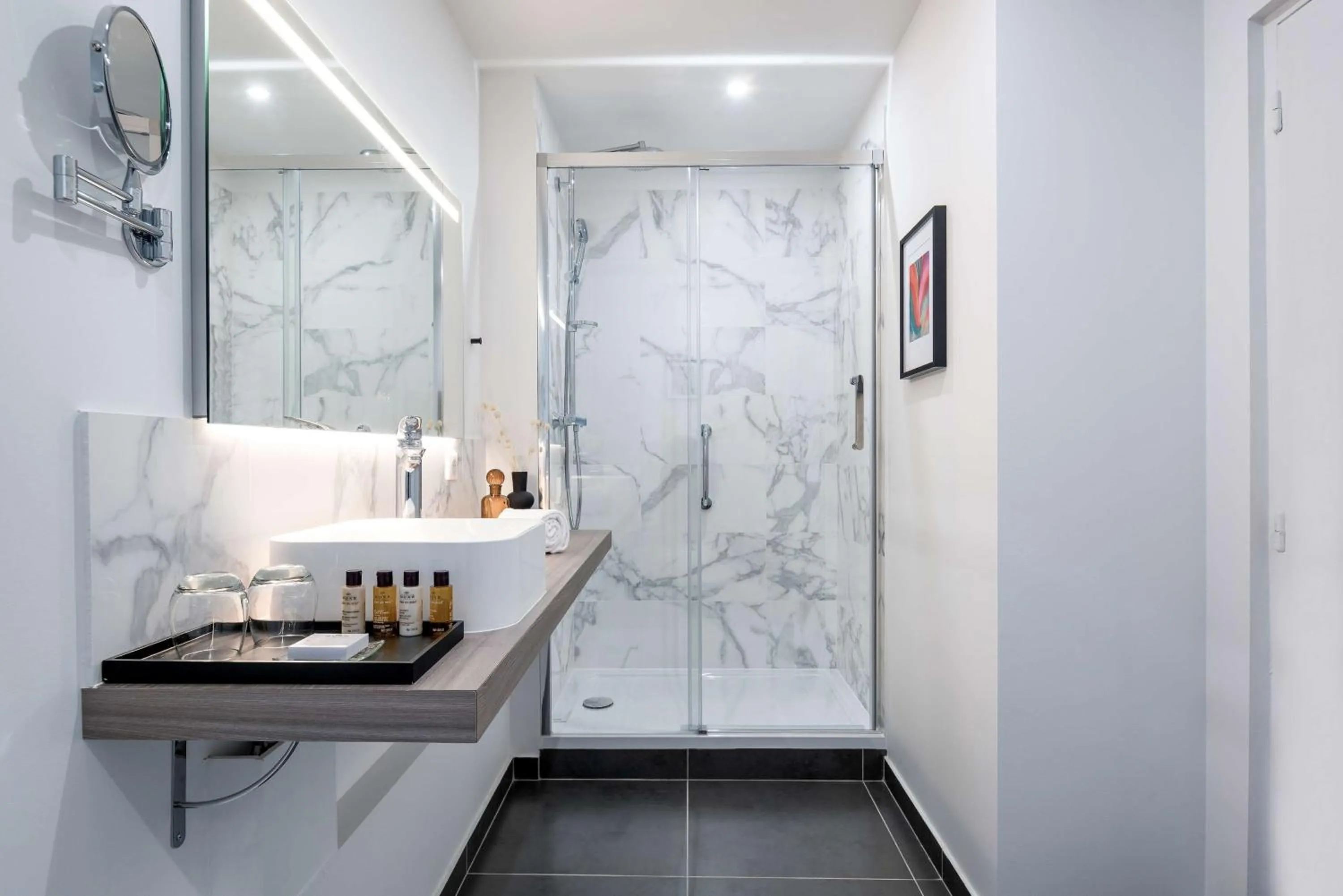 Bathroom in Hotel Camille Paris Tapestry Collection by Hilton