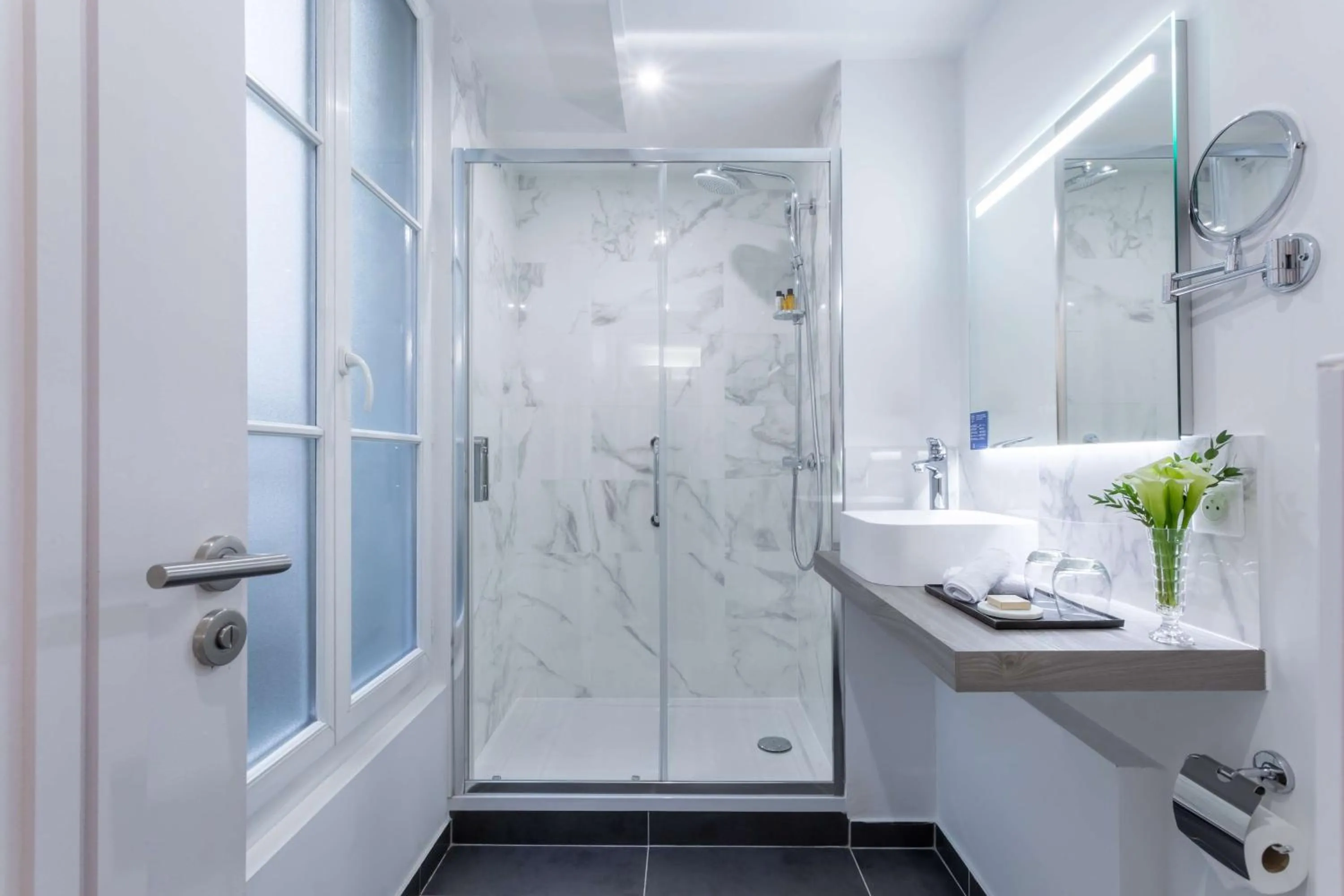 Bathroom in Hotel Camille Paris Tapestry Collection by Hilton