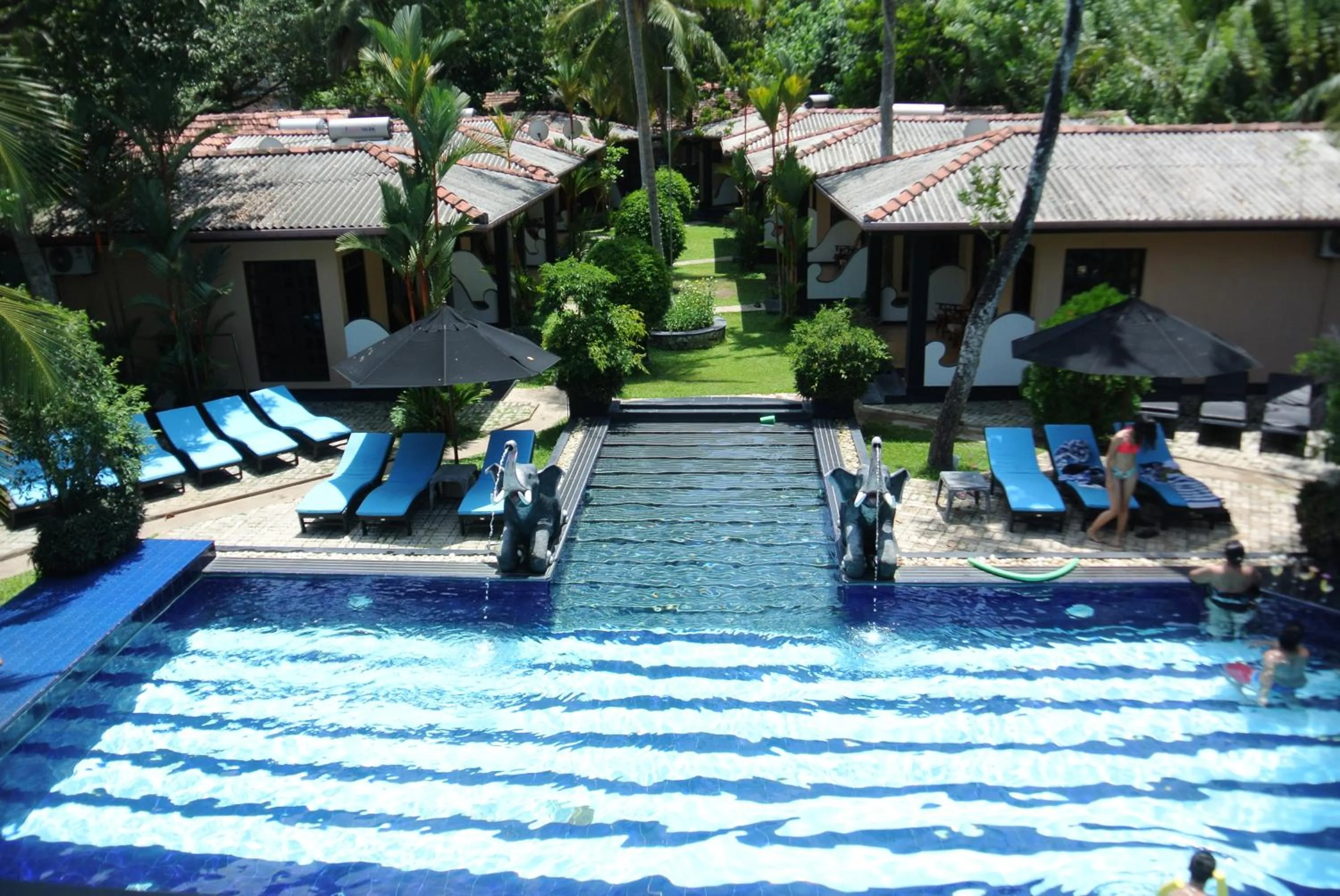 Swimming pool in Hotel Flower Garden