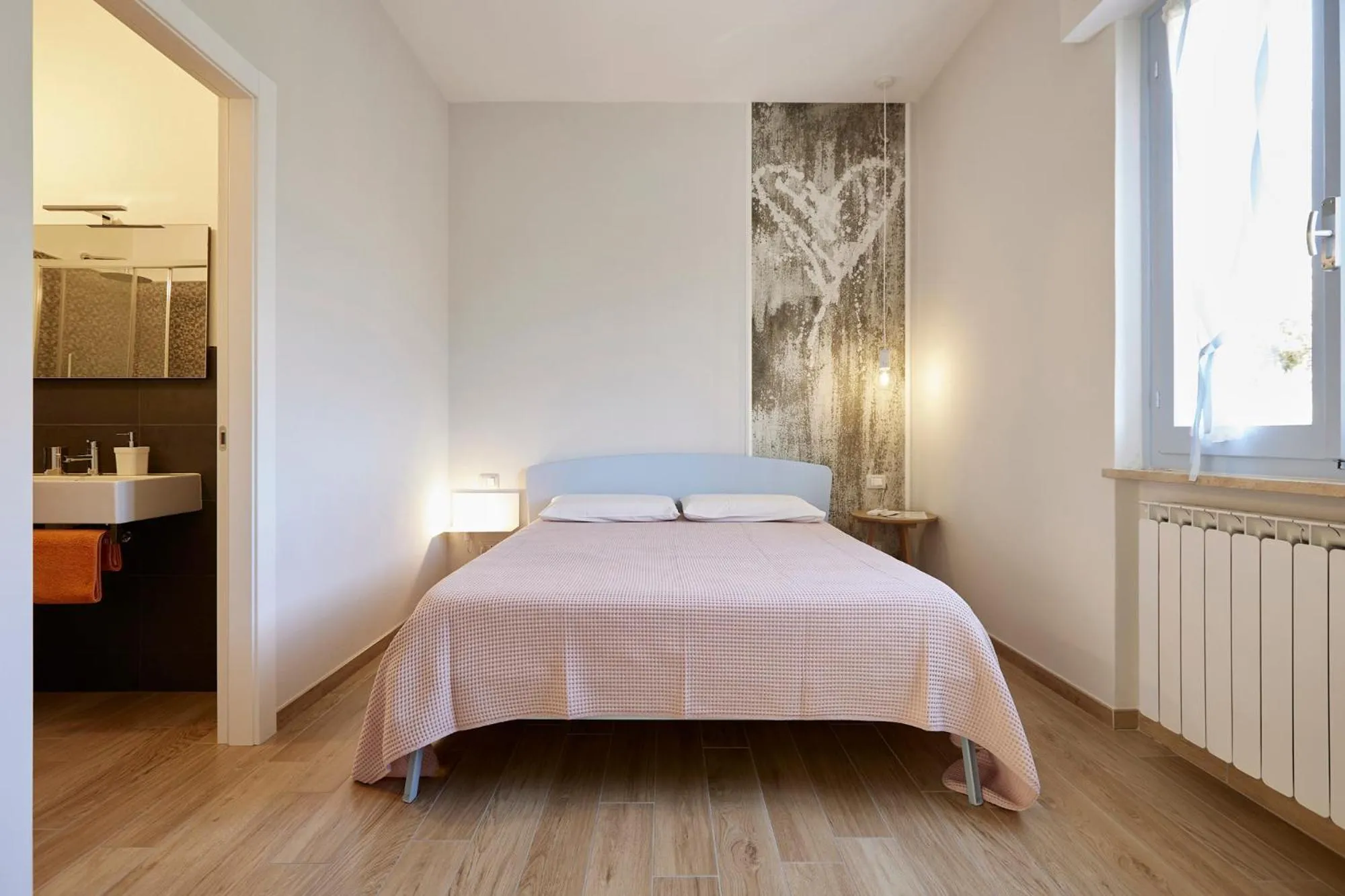 Bed in La Camelia Bianca B&B