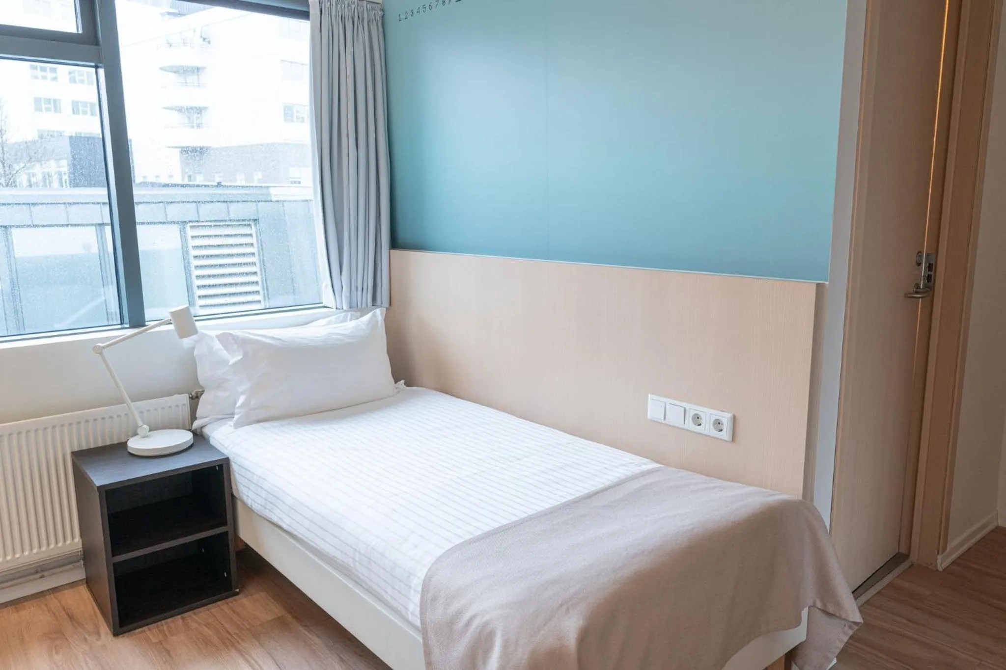 Property building, Bed in Reykjavik Lights Hotel by Keahotels