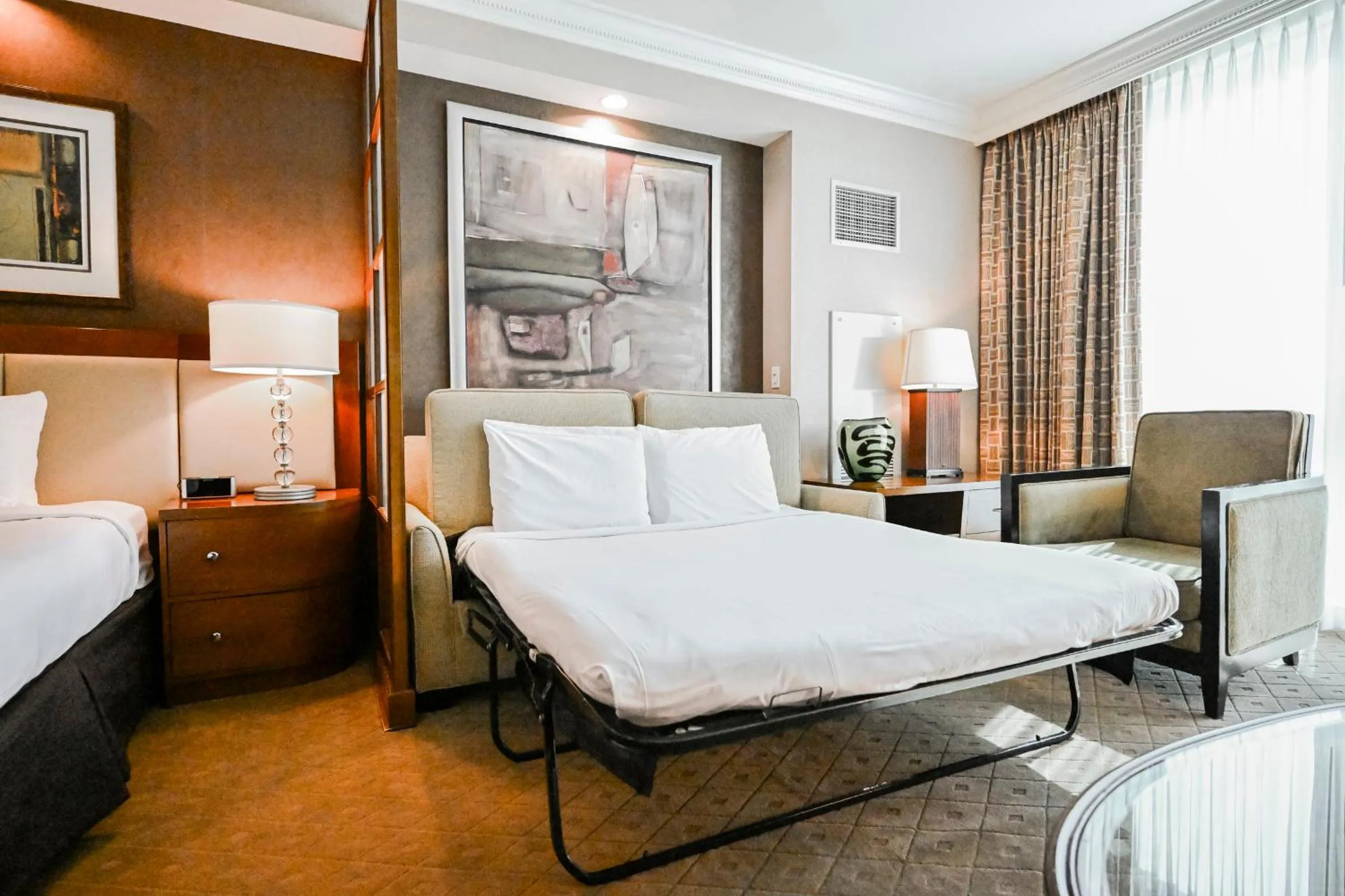 Bed in StripViewSuites Penthouse Two-Bedroom Conjoined Suite