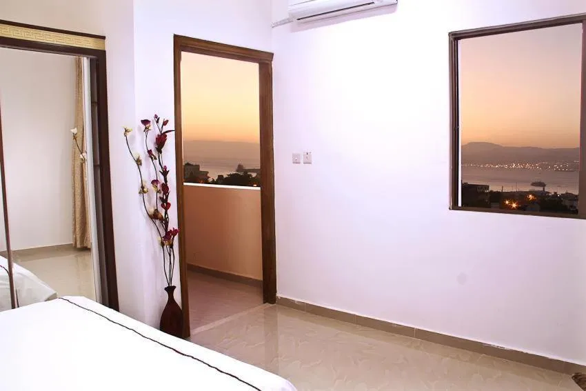 View (from property/room), Bed in Golden Rose Hotel