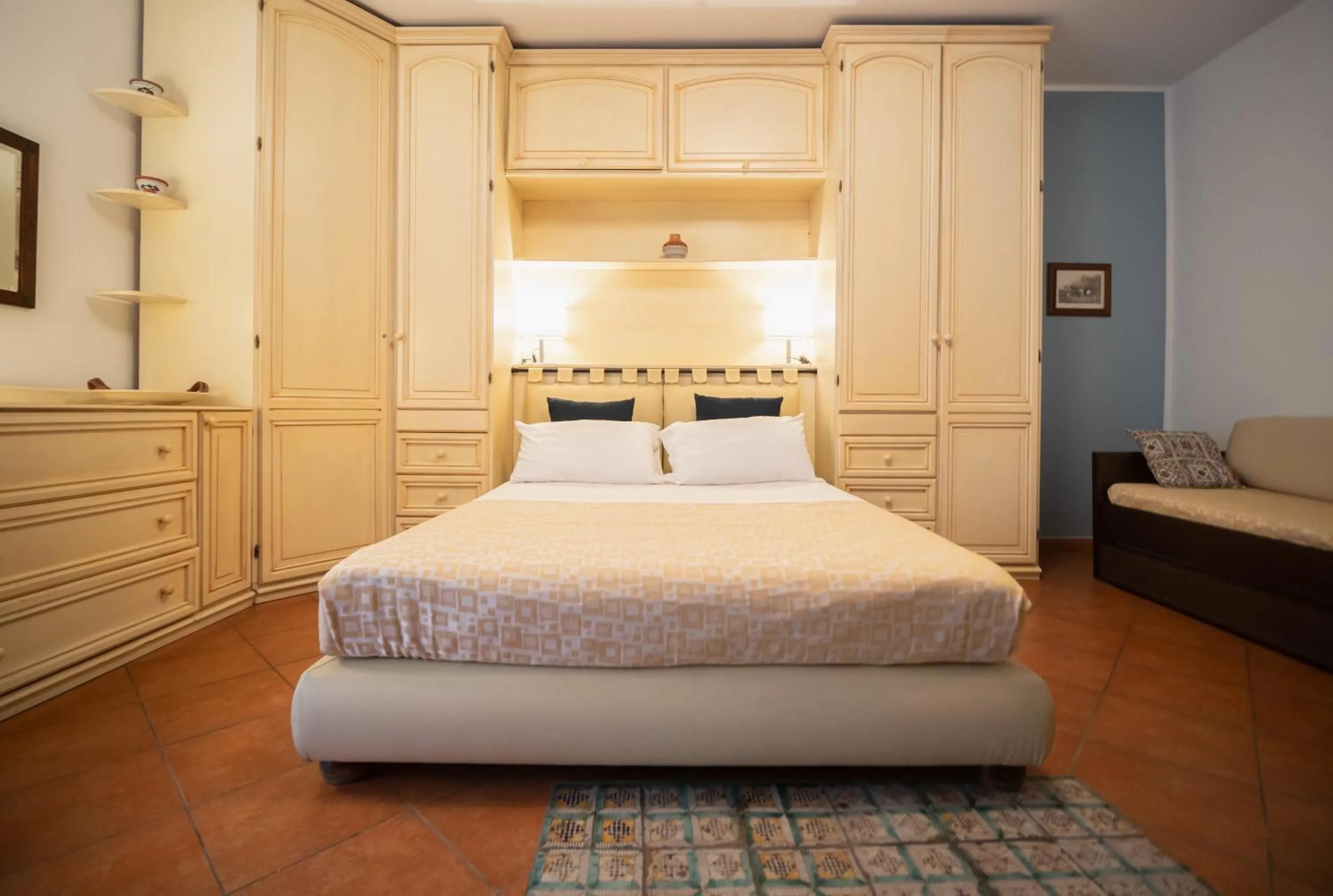 Bed in Kalamarina Rooms