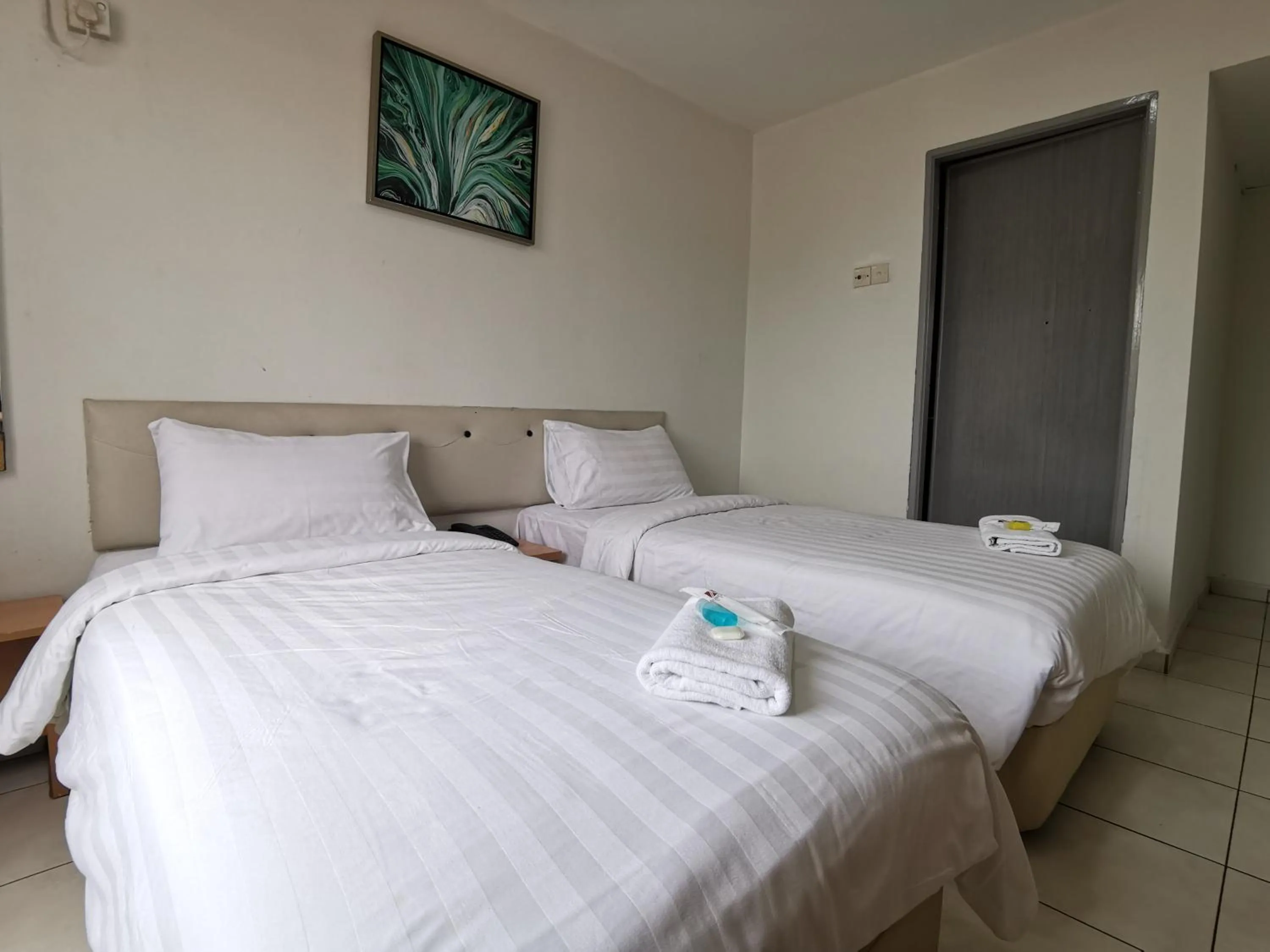 Bed in De Ocean Hotel