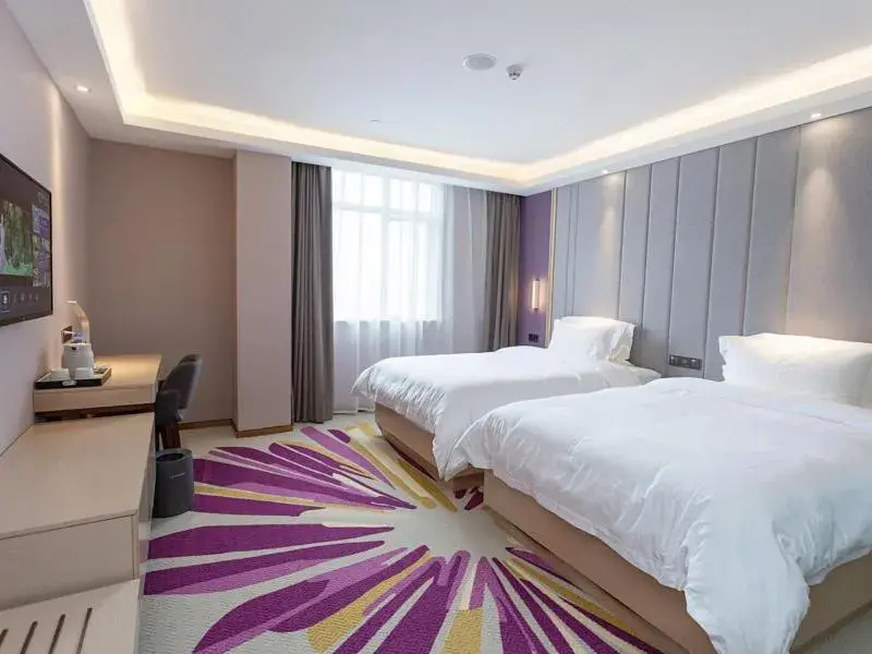 Bed in Lavande Hotel (Yongxin Bubugao Times Square) Bed in Lavande Hotel (Yongxin Bubugao Times Square)