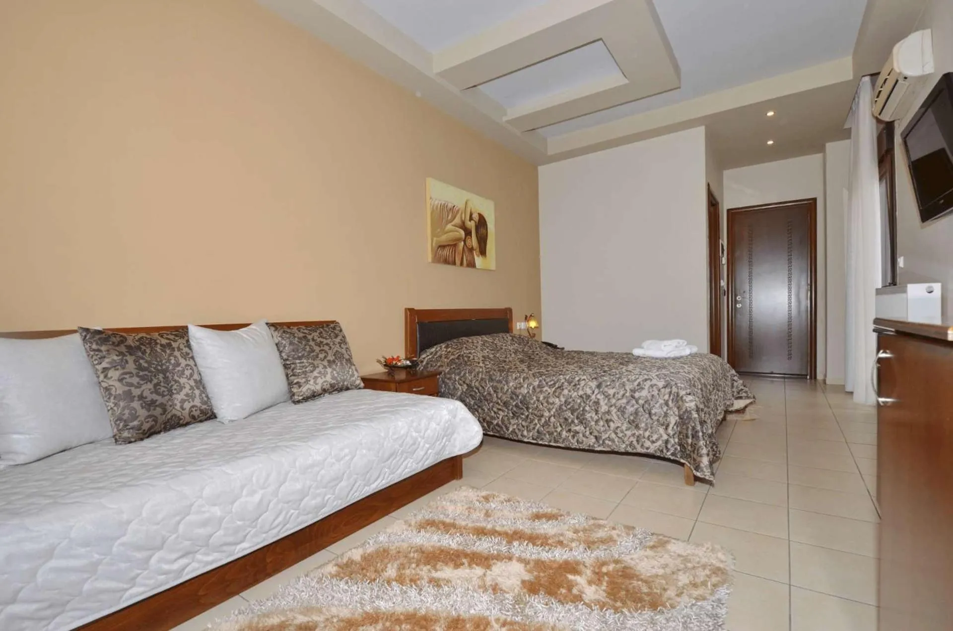 Bed in Hotel Philippion