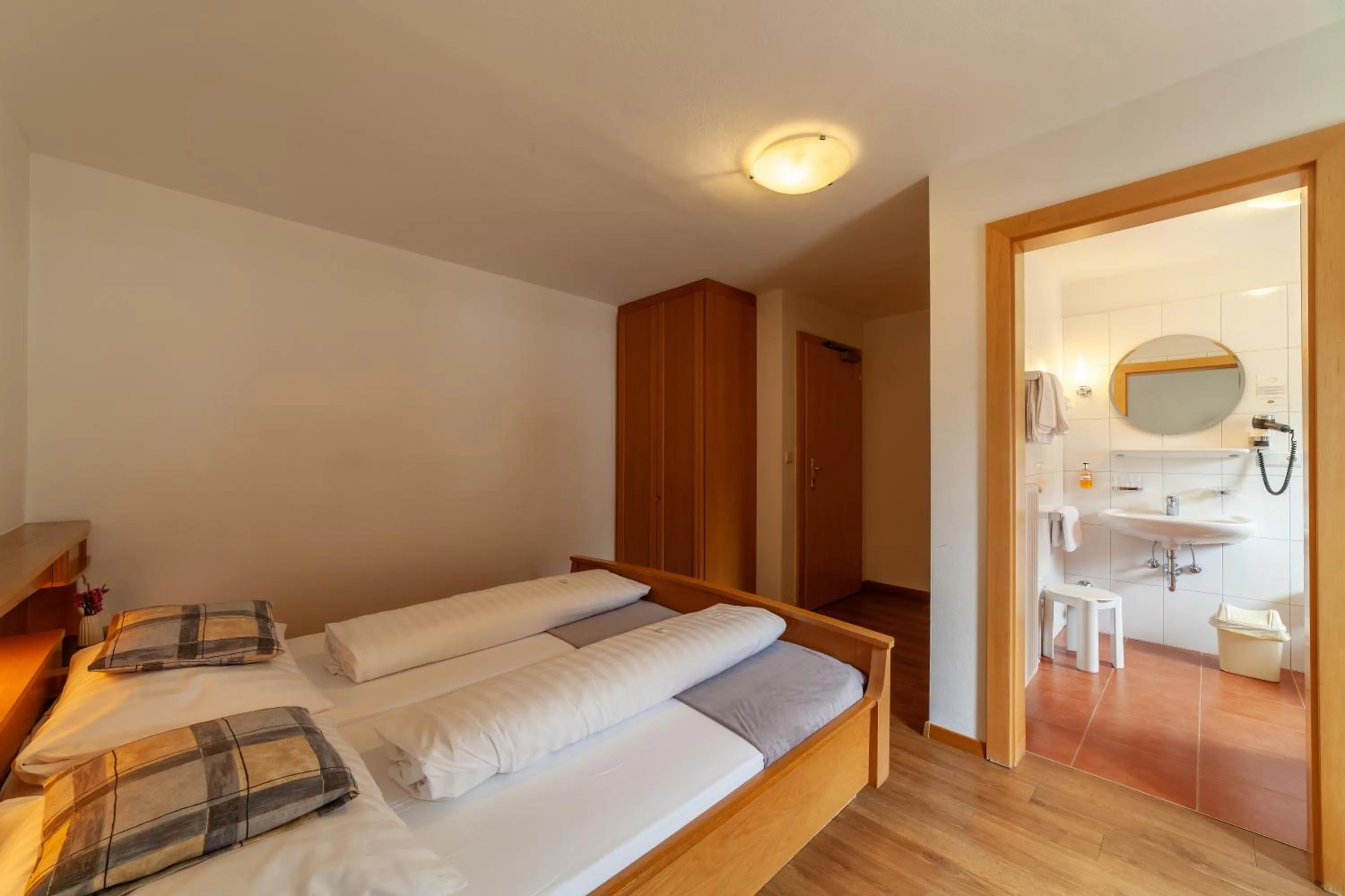 Photo of the whole room, Bed in Almhotel Bergerhof