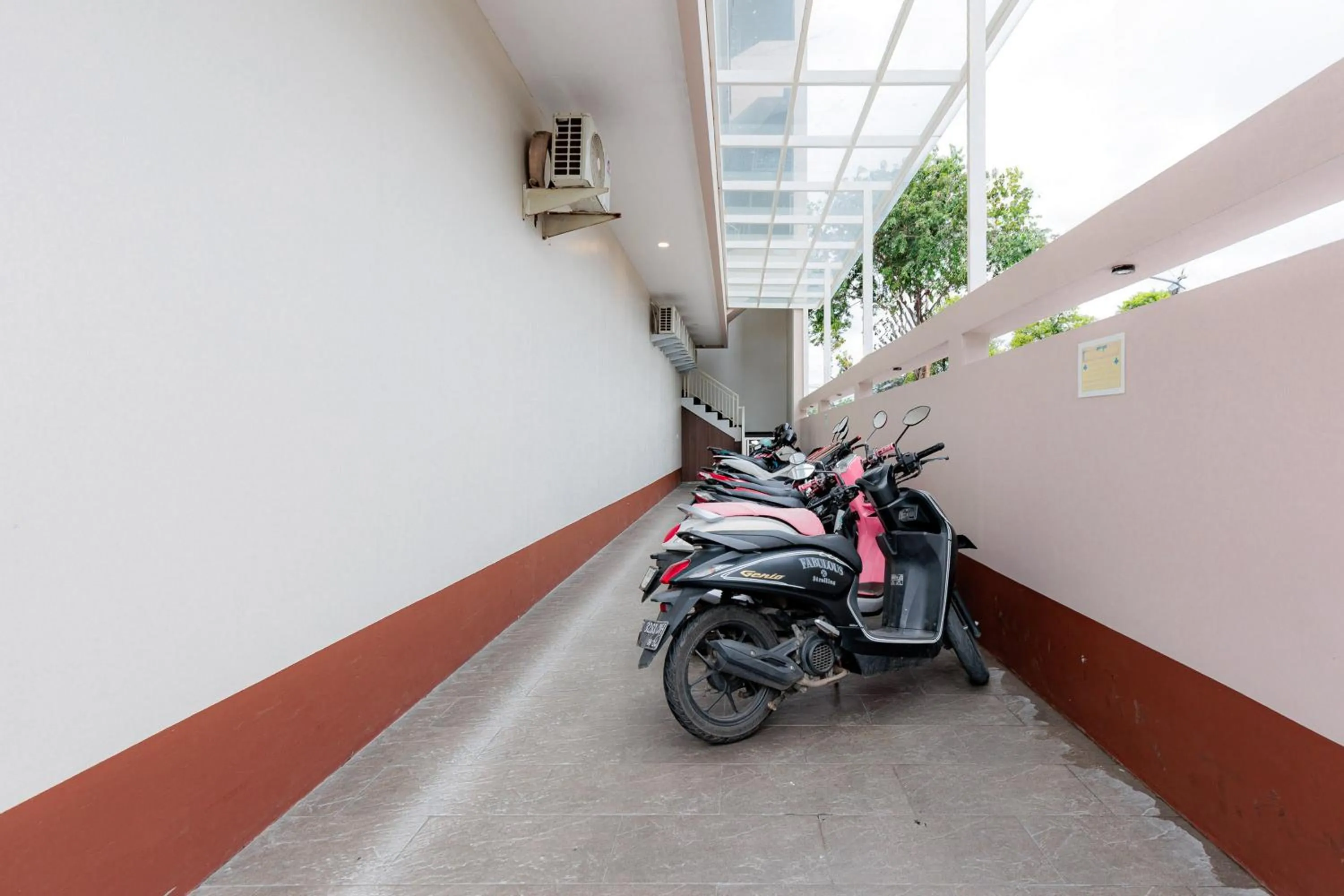 Parking in RedDoorz near Taman Palem