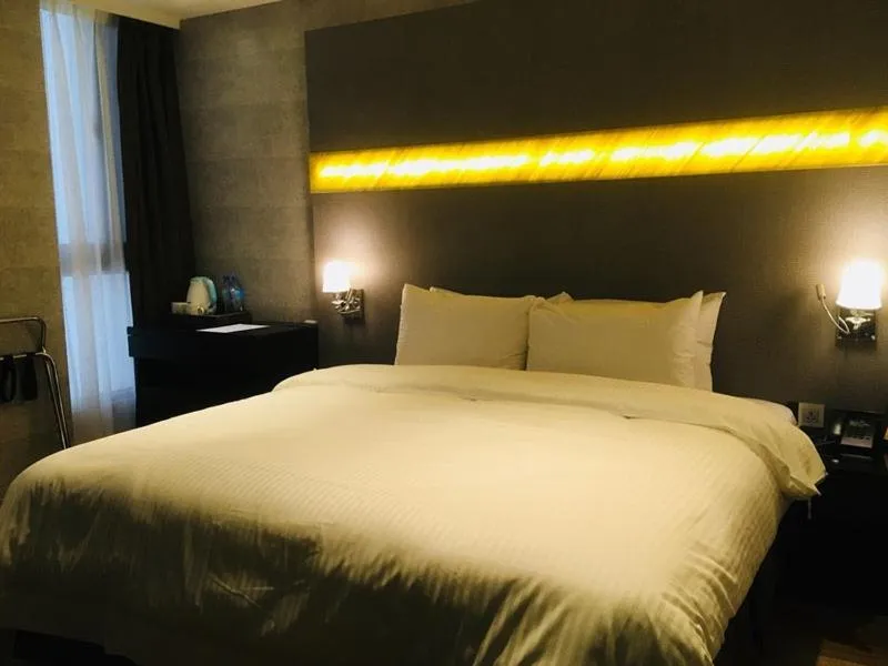 Bed in Fengjia Hotel Bell