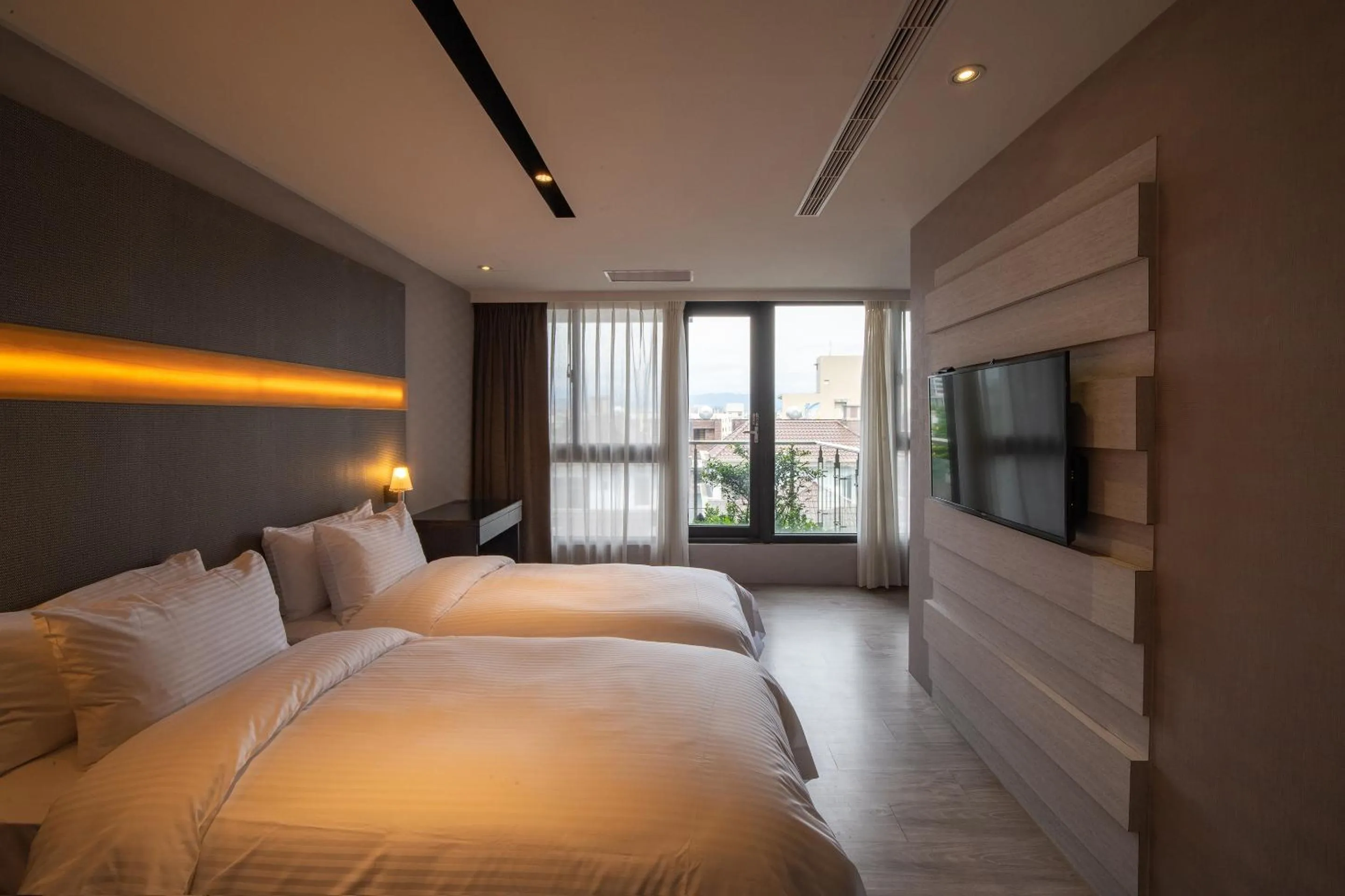 Photo of the whole room, Bed in Fengjia Hotel Bell