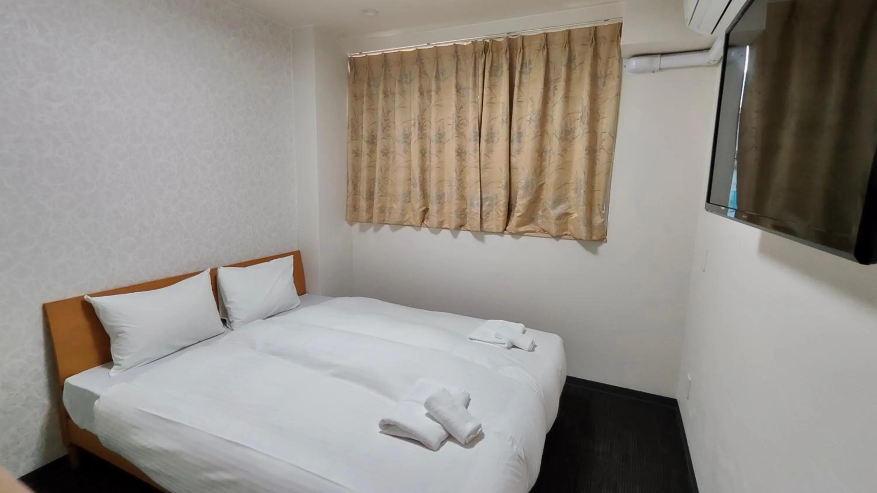 Bed in Dotonbori Shinsaibashi Hotel