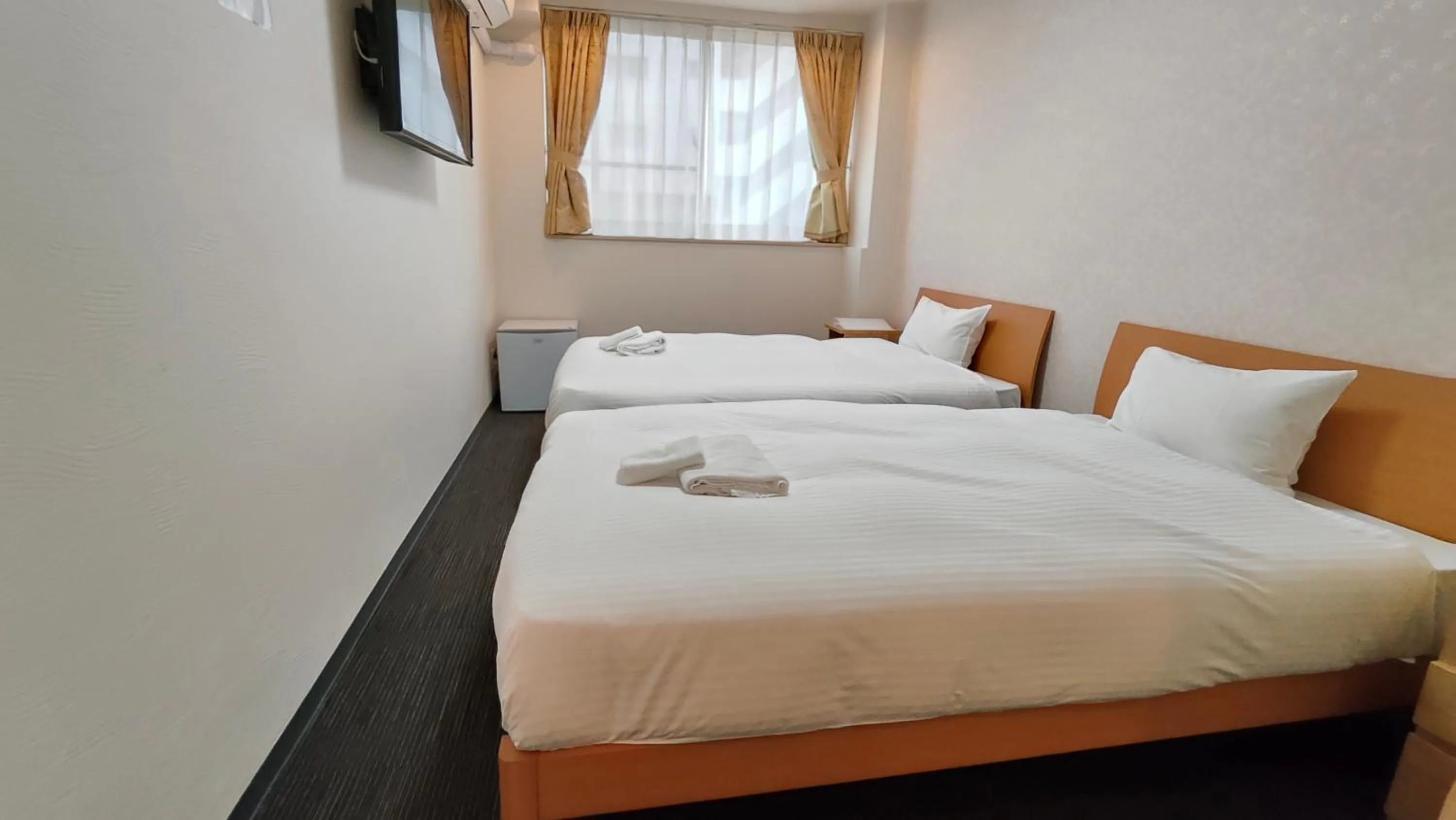 Bed in Dotonbori Shinsaibashi Hotel