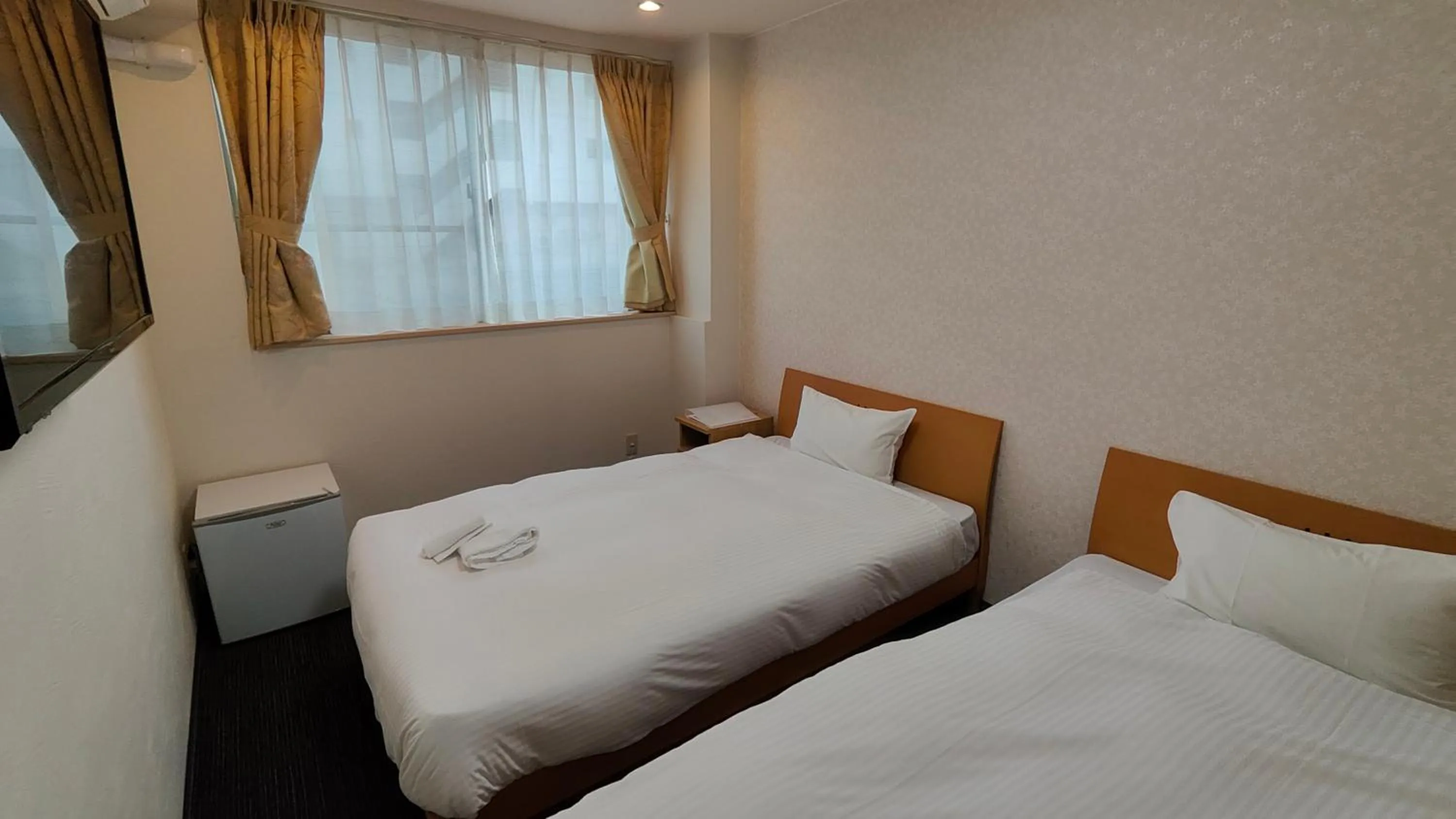 Bed in Dotonbori Shinsaibashi Hotel
