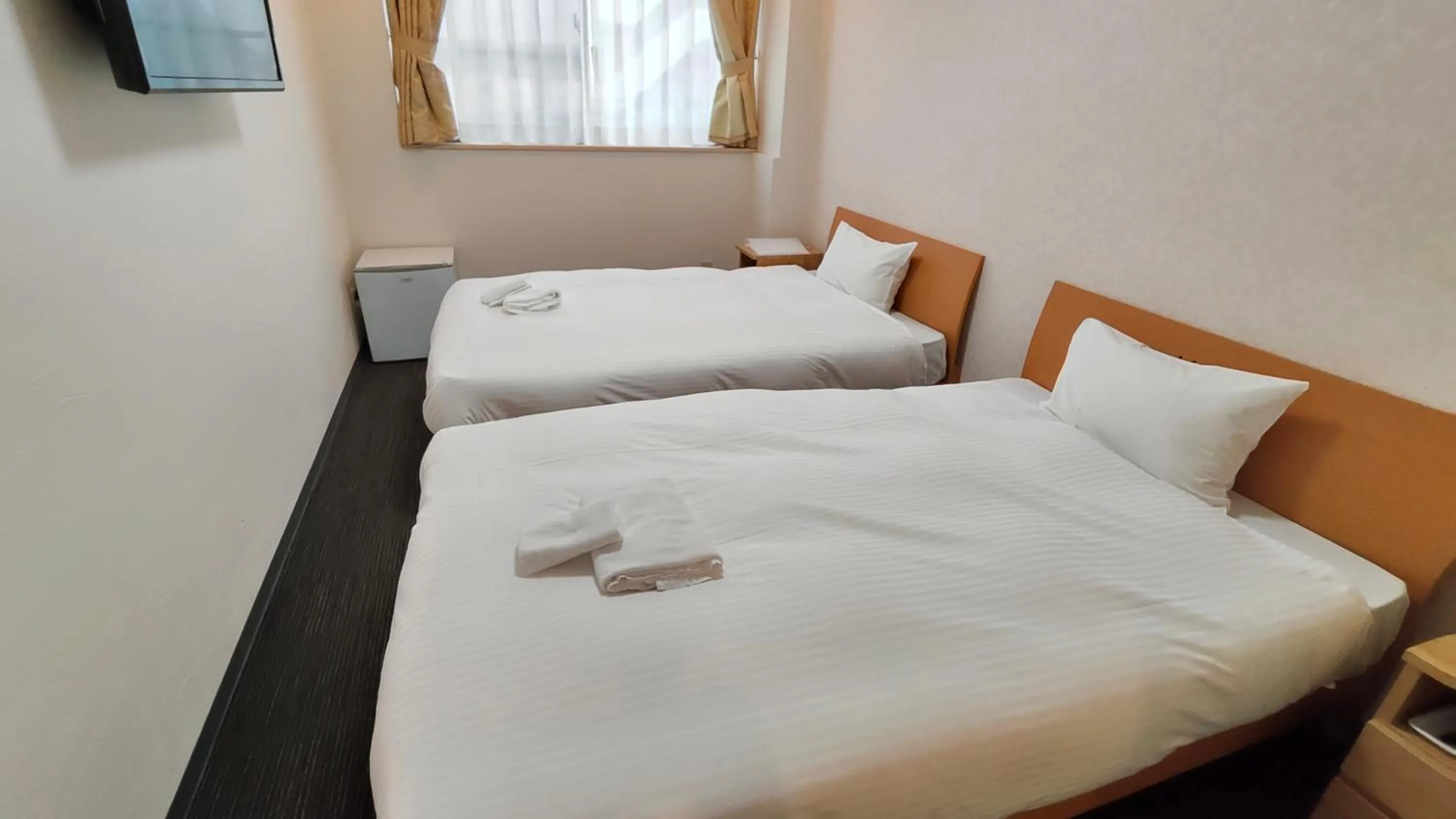 Bed in Dotonbori Shinsaibashi Hotel