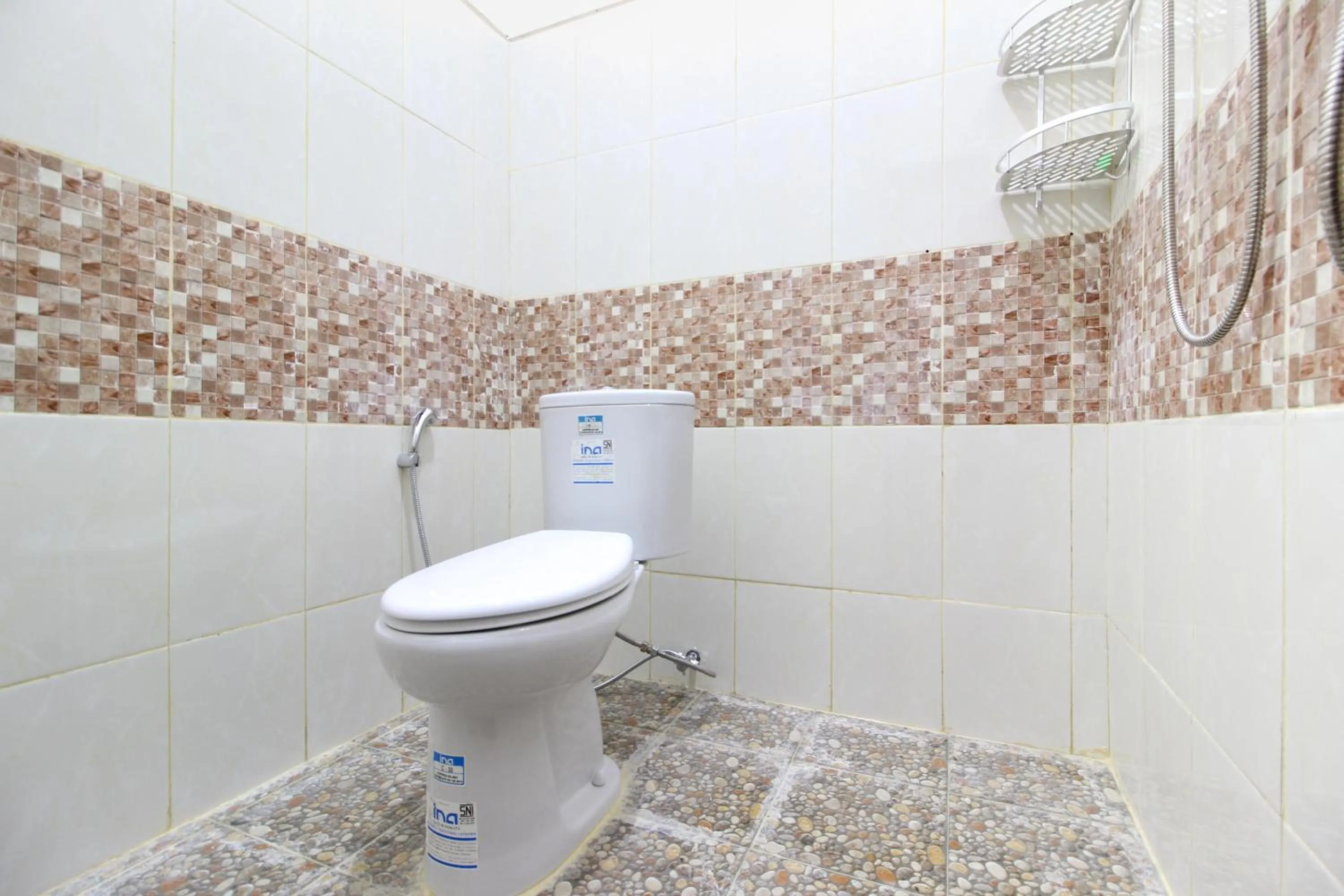 Bathroom in RedDoorz near Museum Gunung Merapi