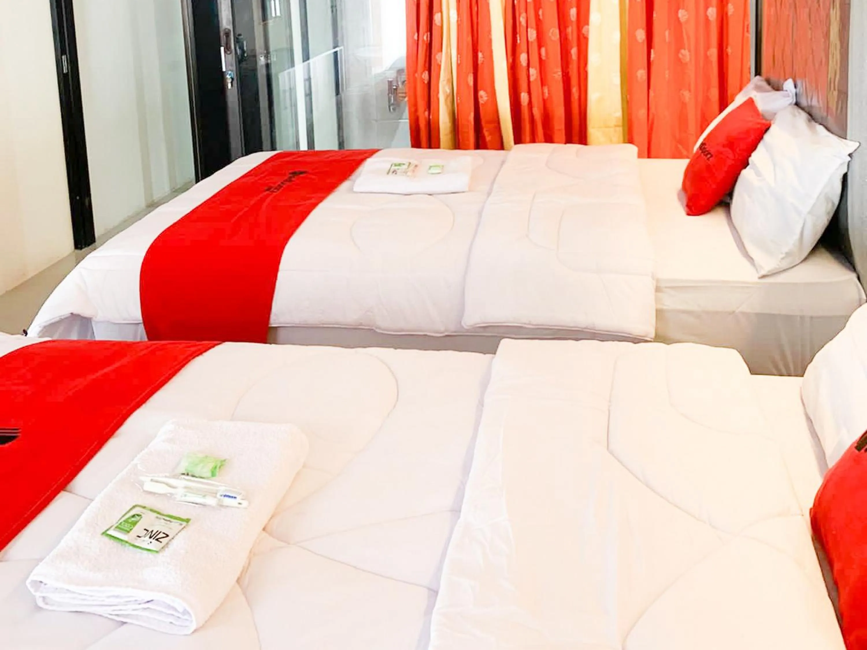 Bed in RedDoorz near Museum Gunung Merapi