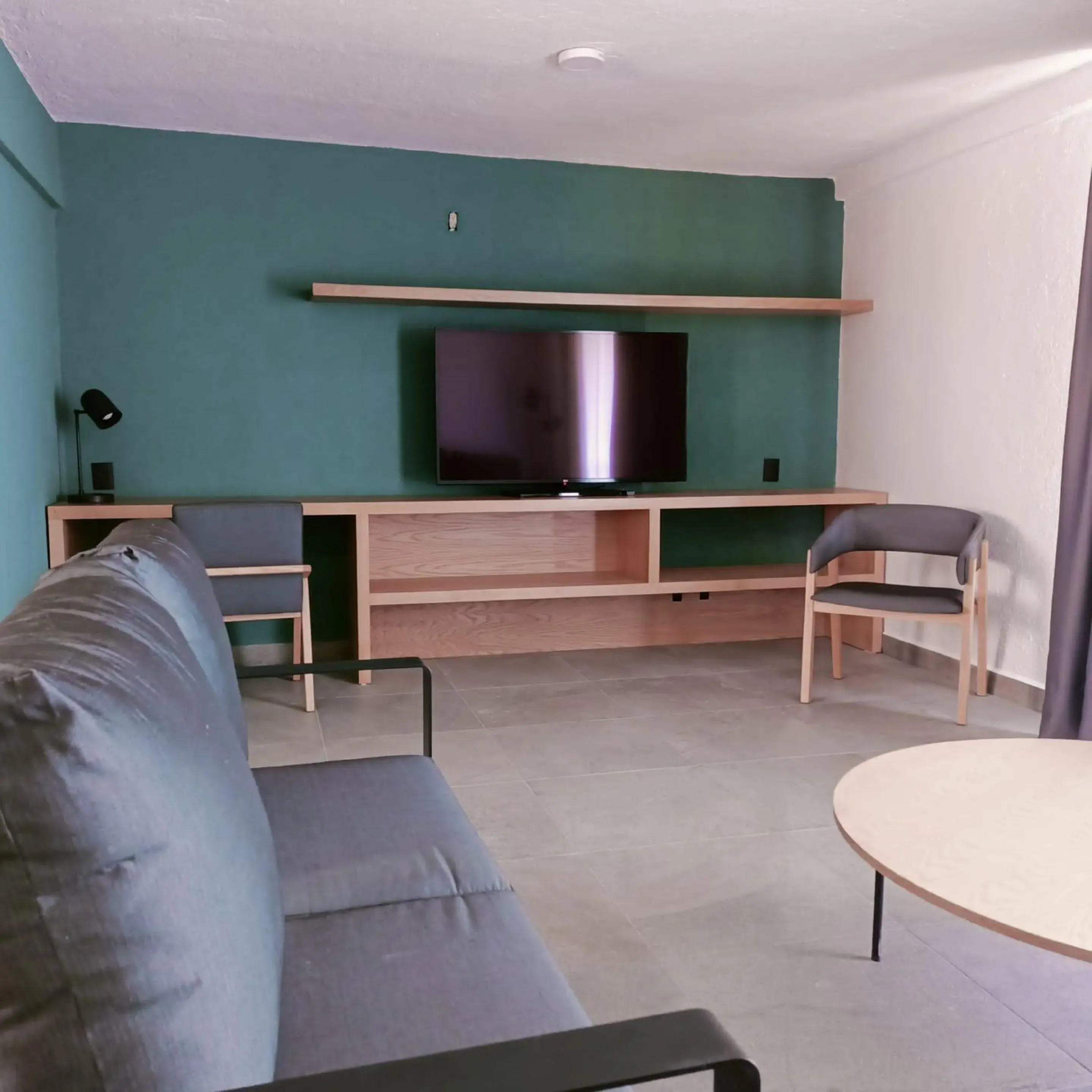 Living room in Sunrock Hotel & Suites Living room in Sunrock Hotel & Suites