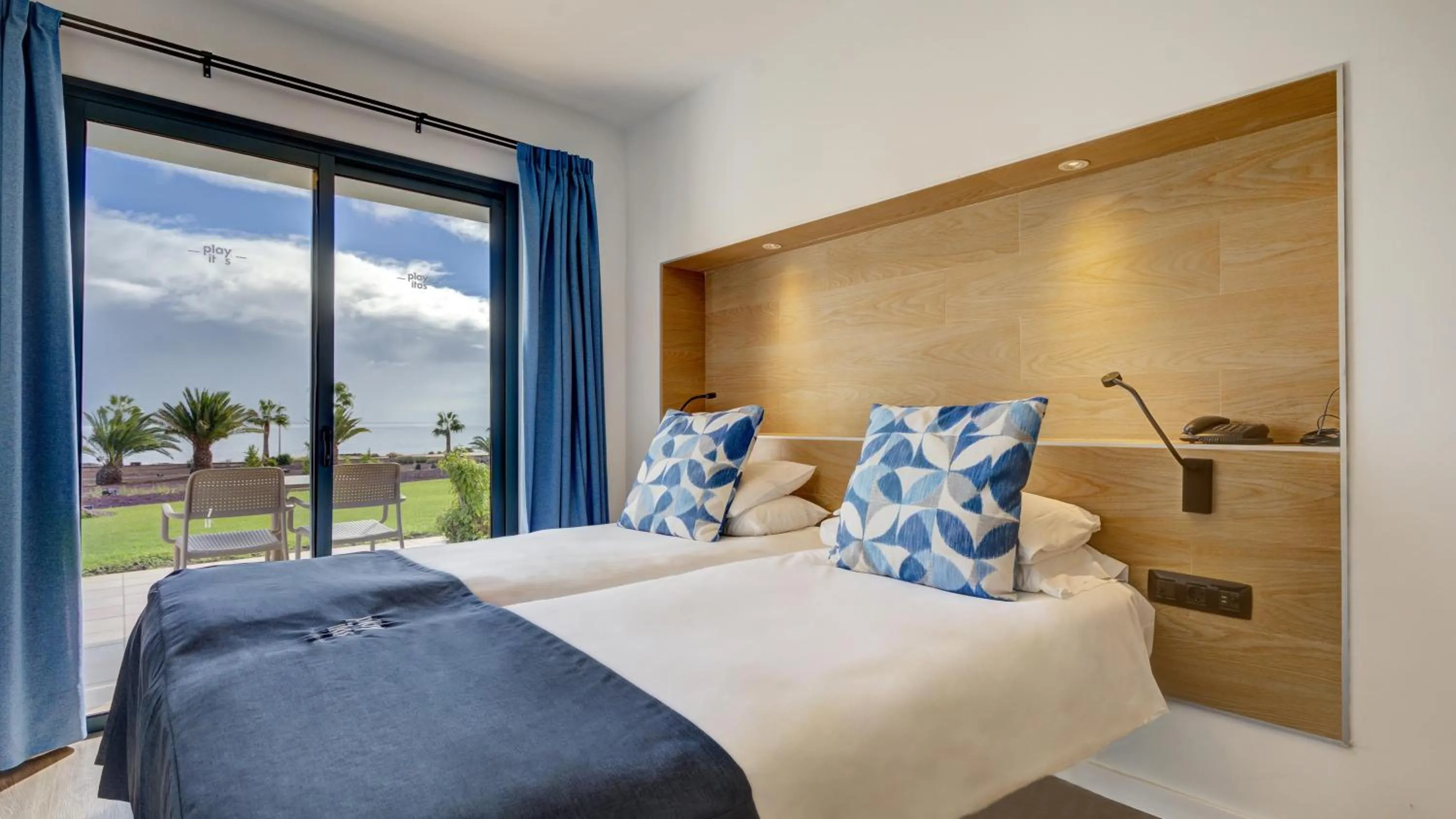 Photo of the whole room, Bed in Playitas Aparthotel - Sports Resort