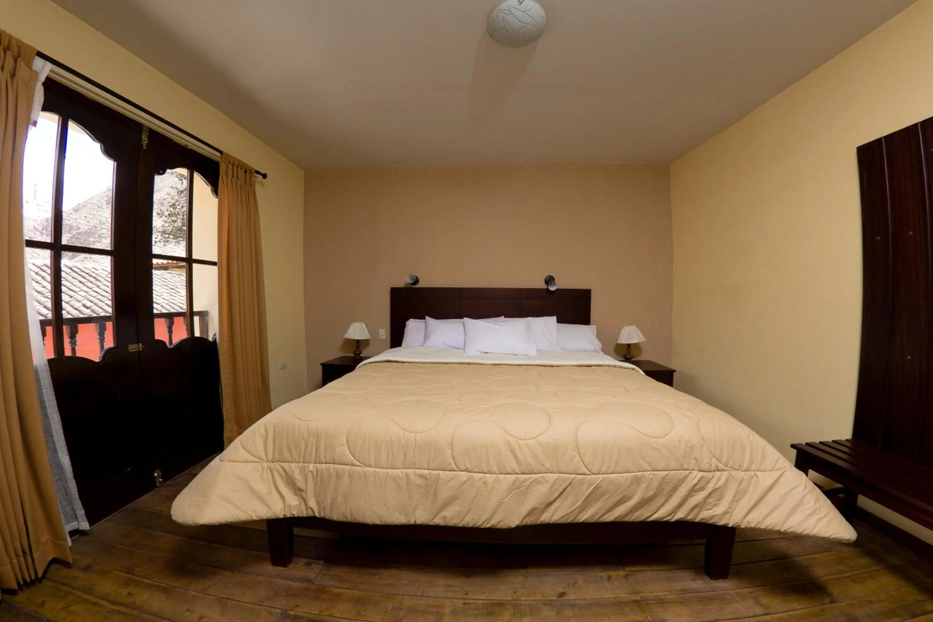 Bedroom in Yucay Plaza Inn