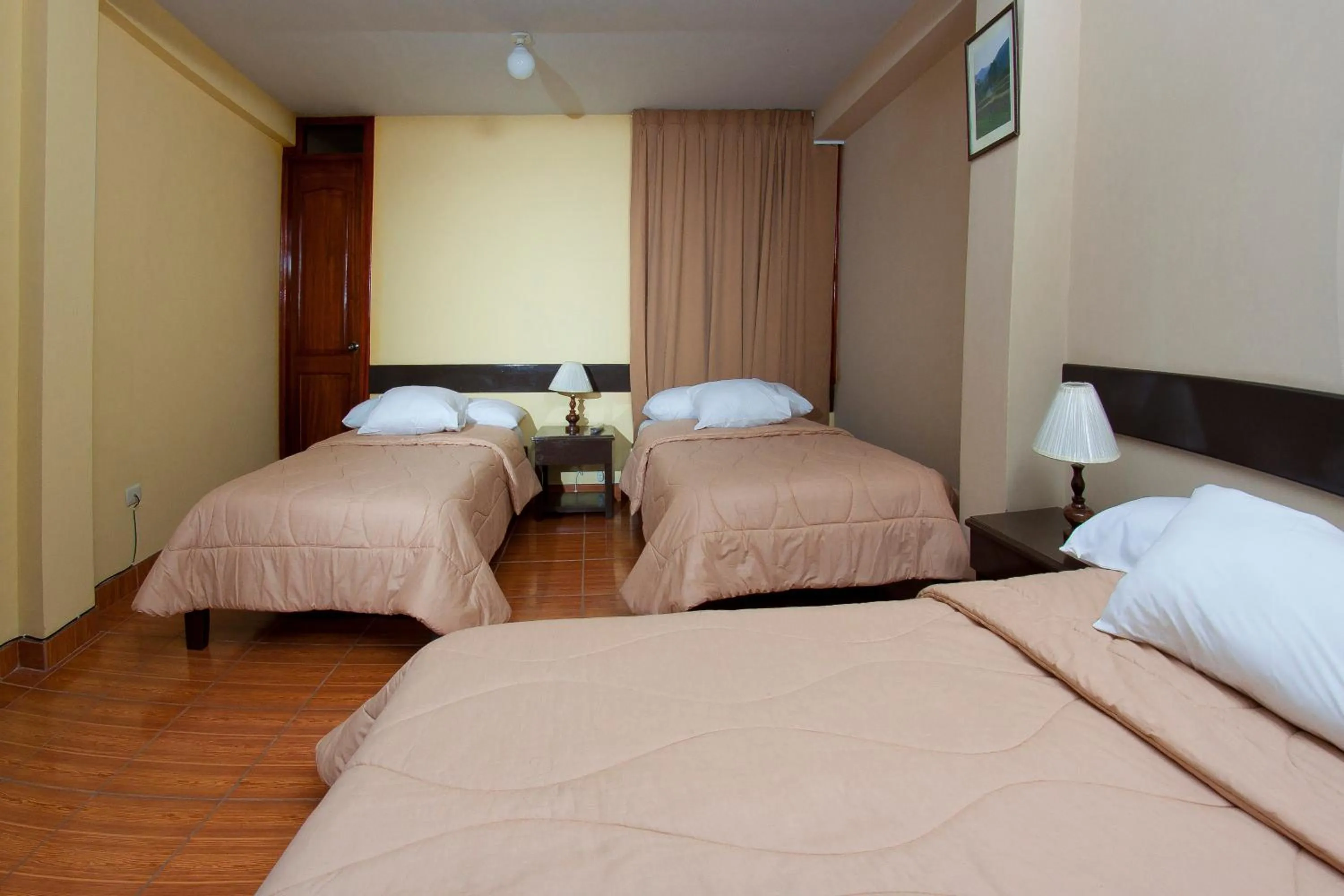 Bedroom in Yucay Plaza Inn