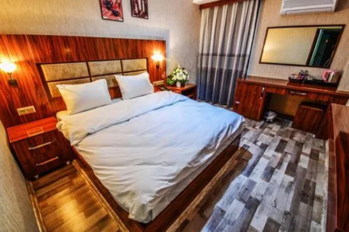 Bed in MARİNA HOTEL