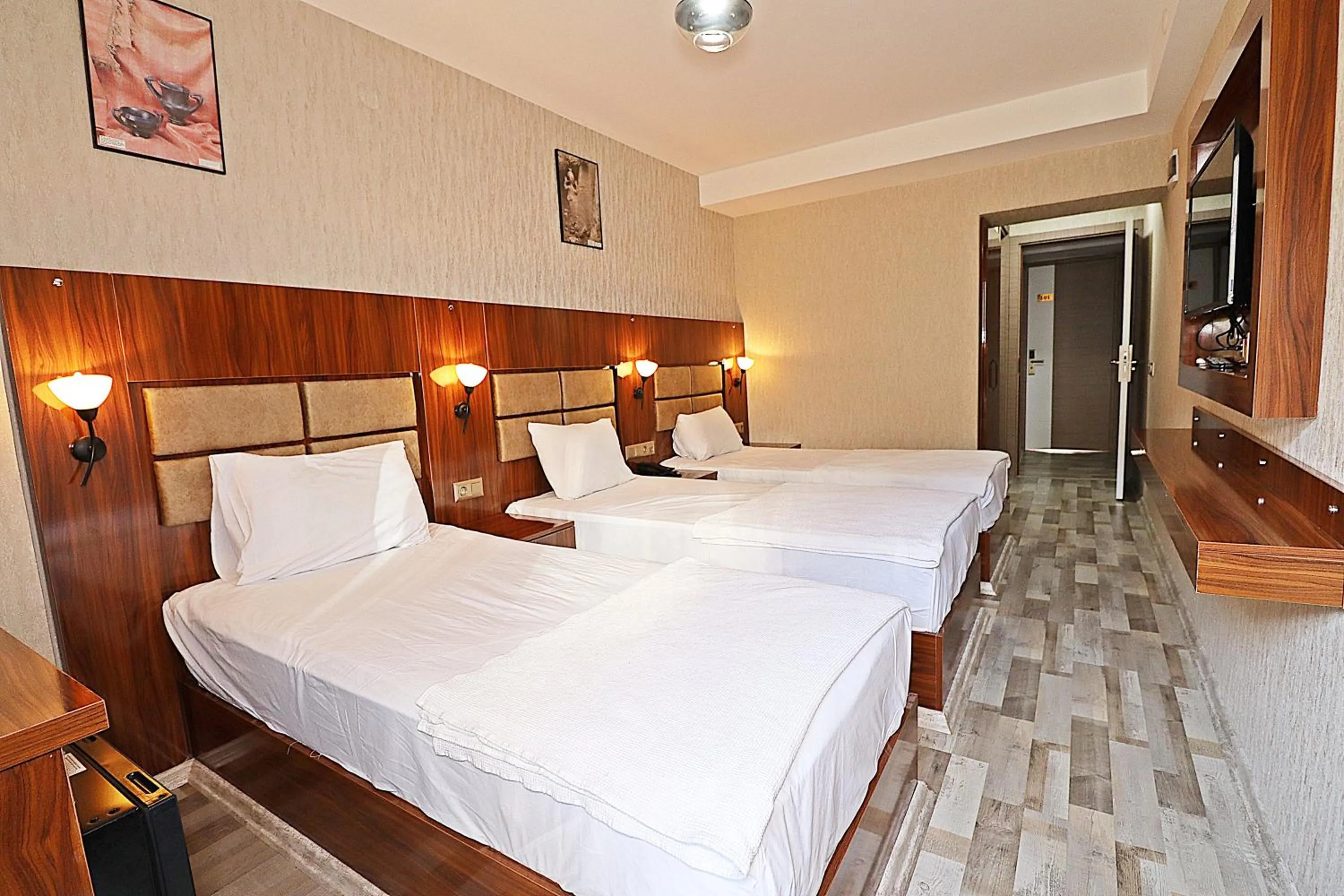 Bed in MARİNA HOTEL