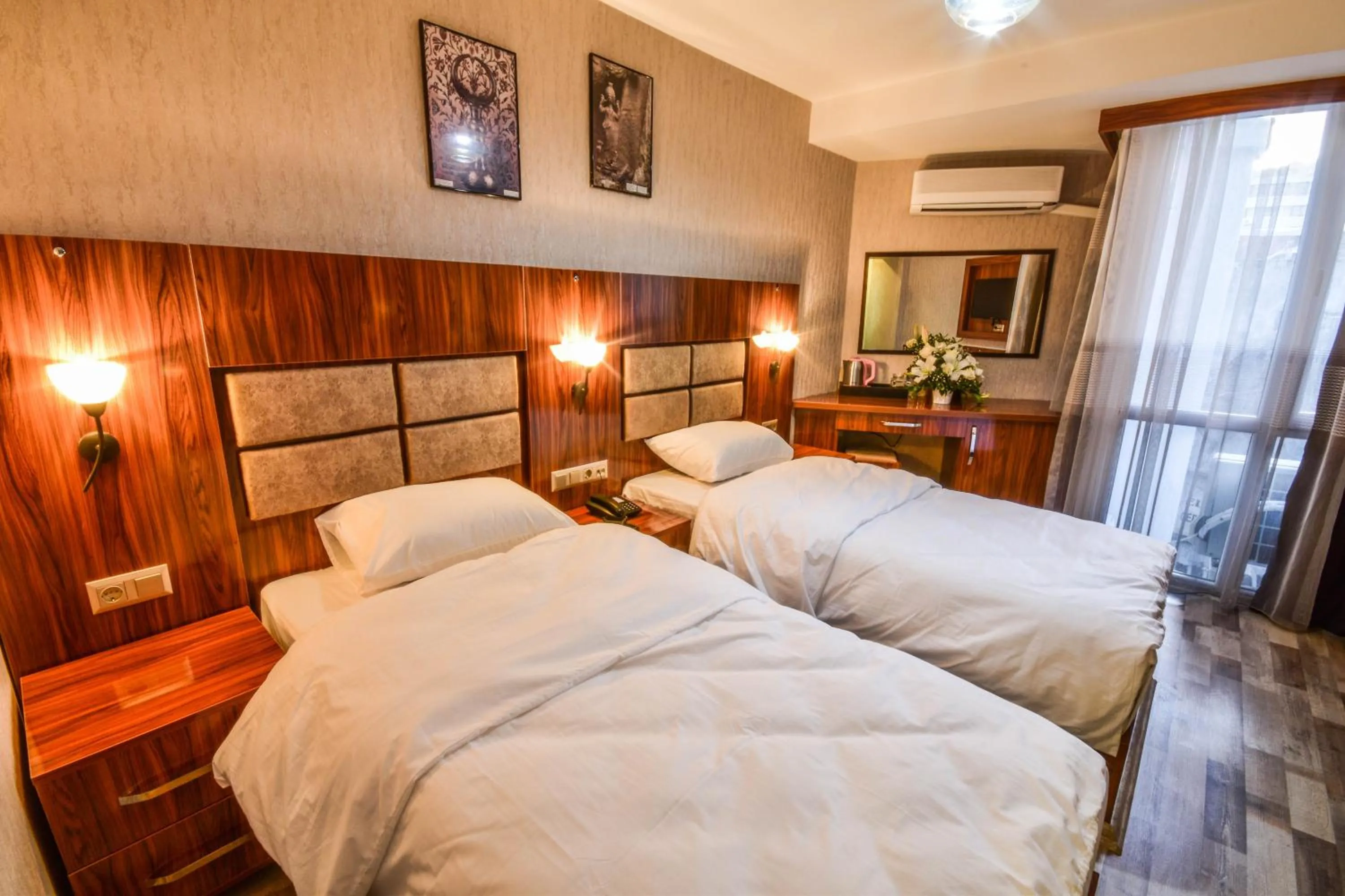 Bed in MARİNA HOTEL