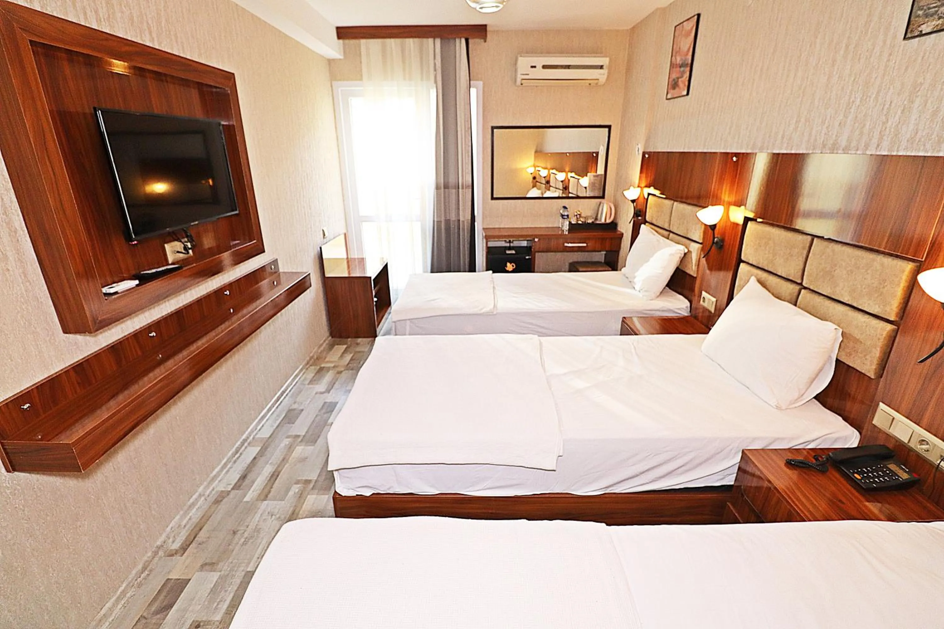 Bed in MARİNA HOTEL