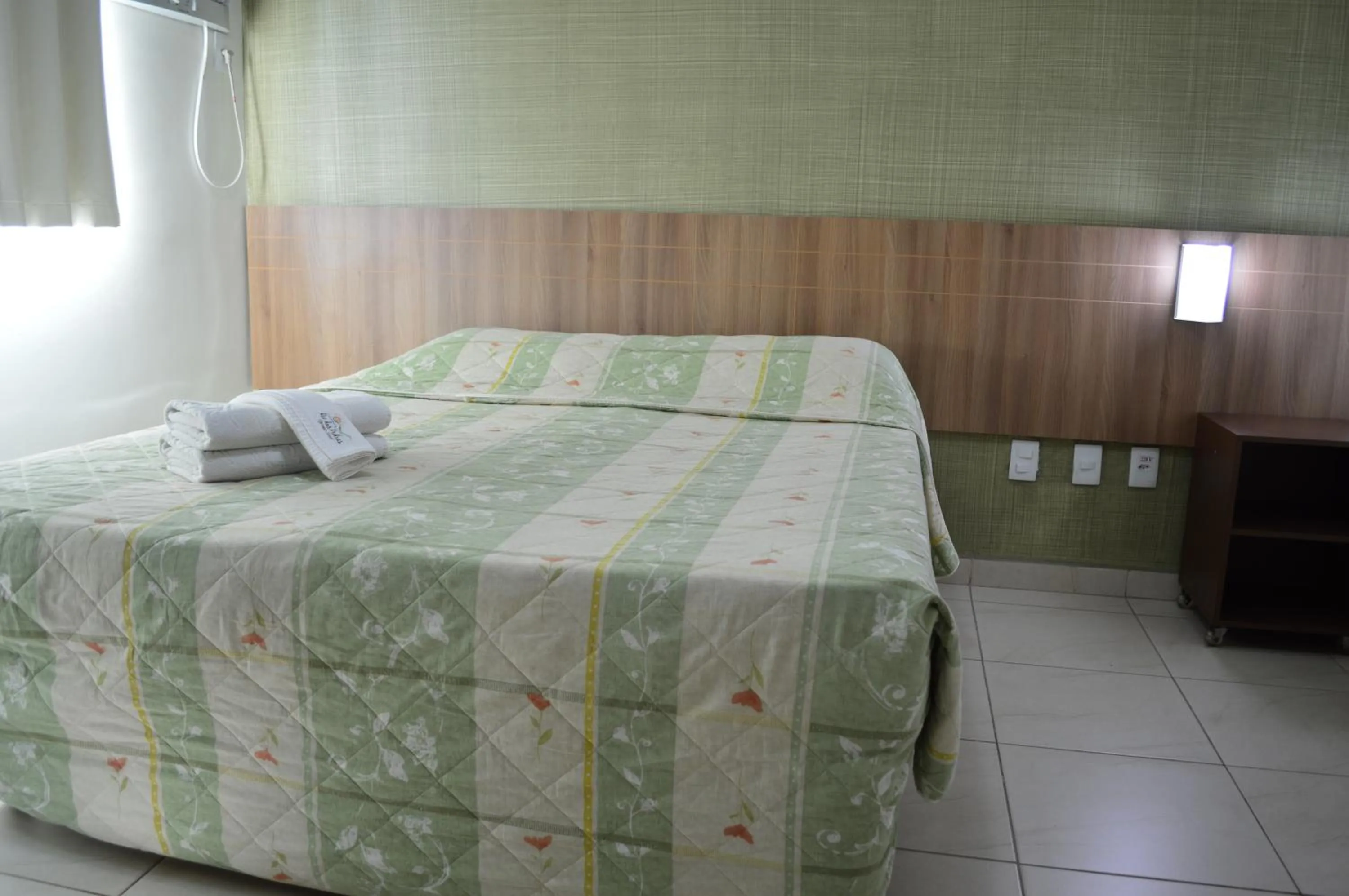 Bed in Rio das Pedras Thermas Hotel