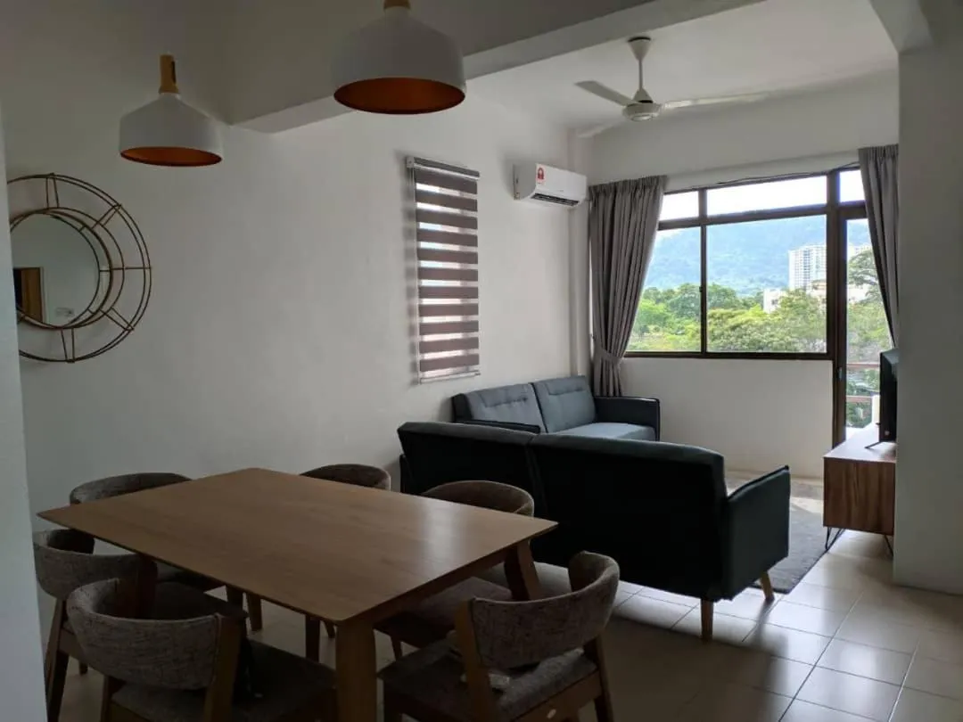 Living room in Arcadia Penang by Plush