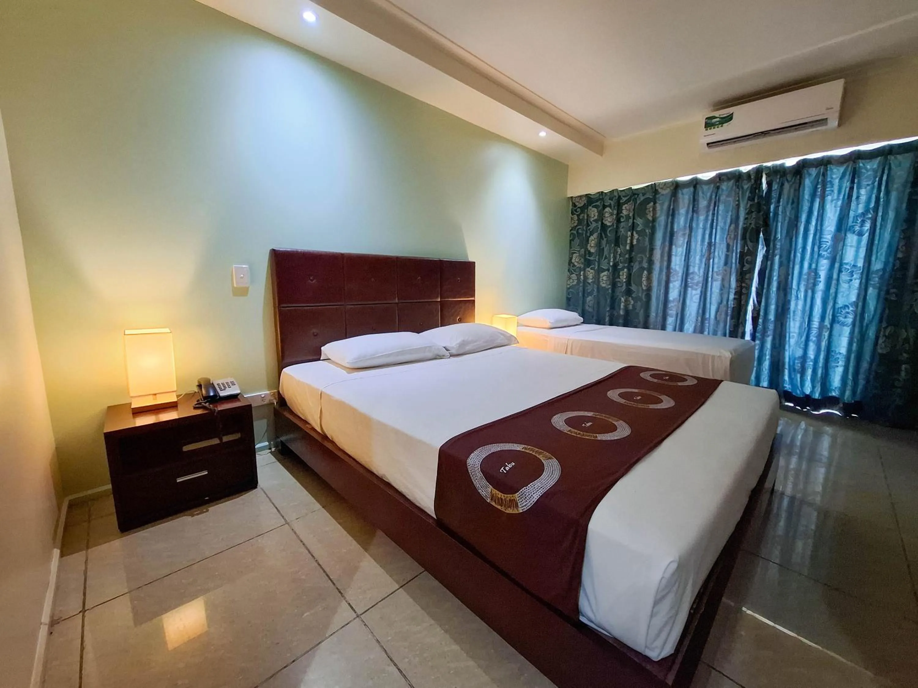 Bed in Gazelle International Hotel