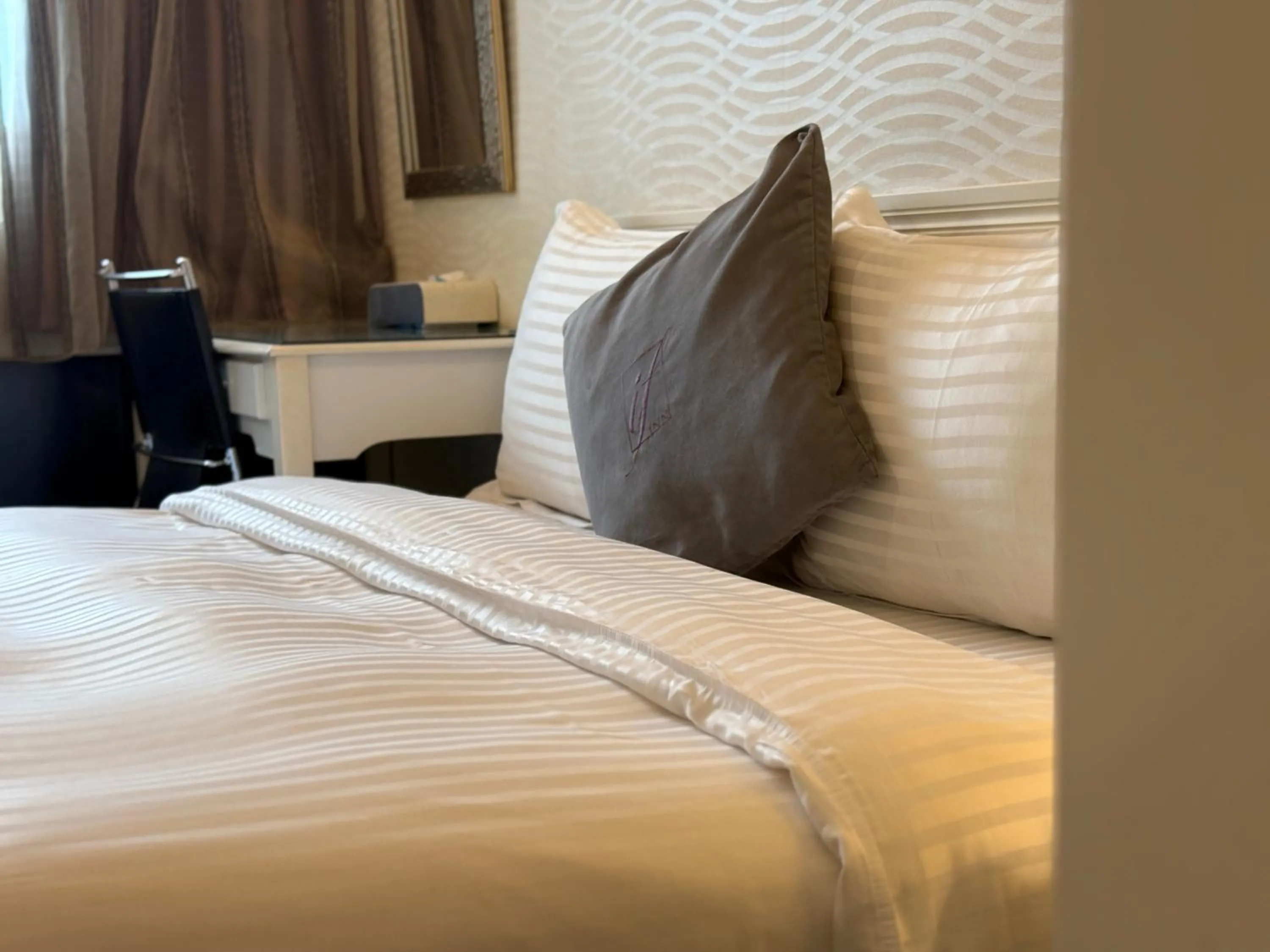 Bed in 意芙旅店 Ifinn Hotel