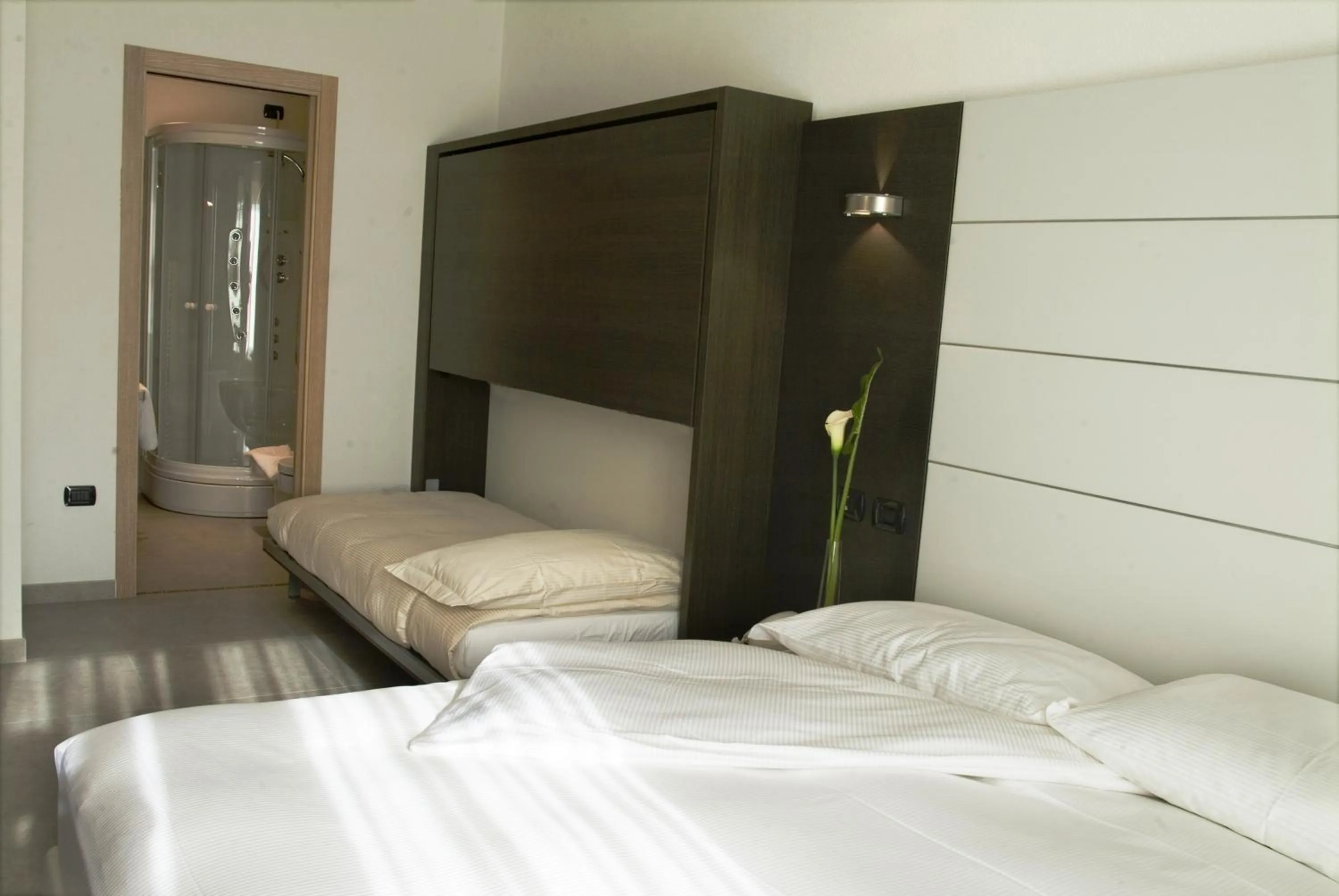 Bed in Hotel San Lorenzo Chiavenna