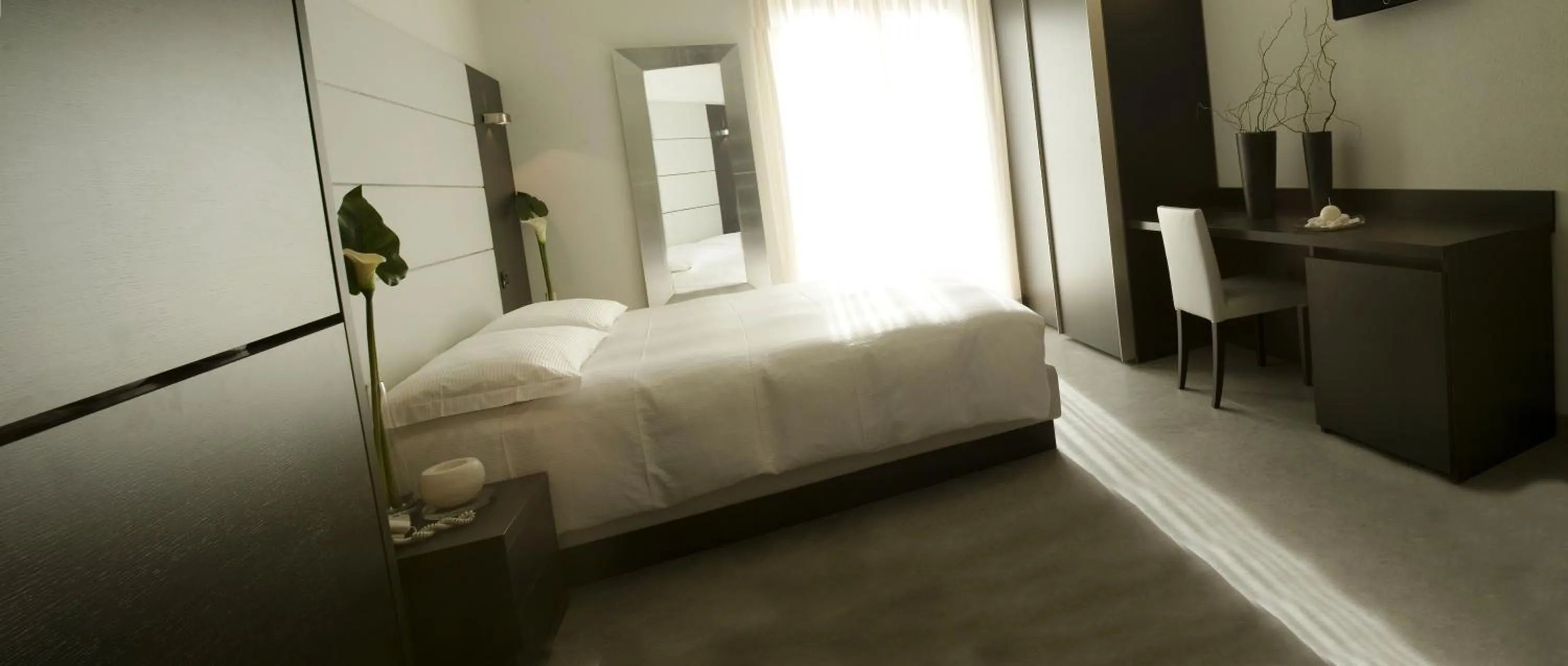 Bed in Hotel San Lorenzo Chiavenna