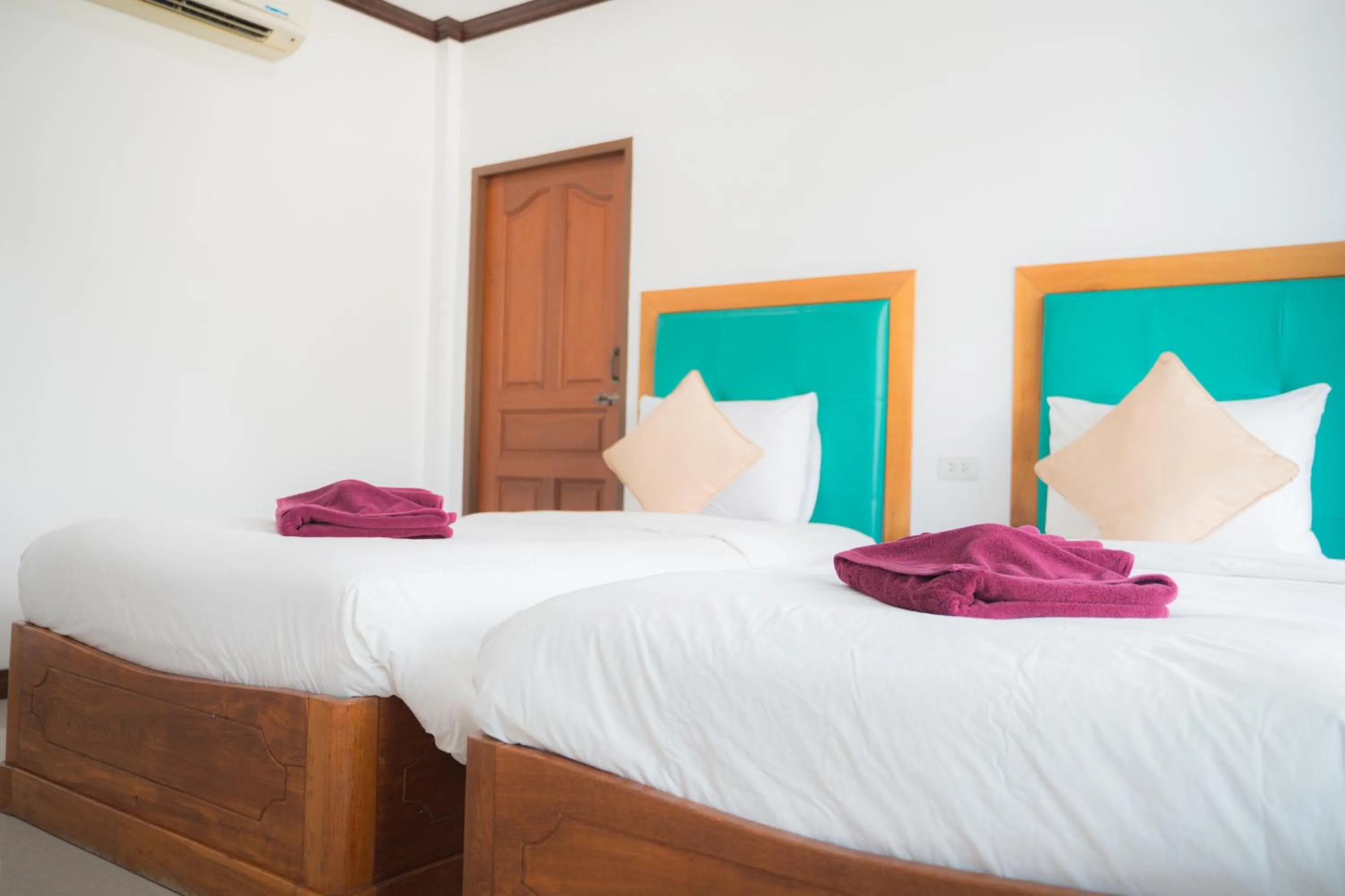 Bed in Baan Faa Talaychan Resort