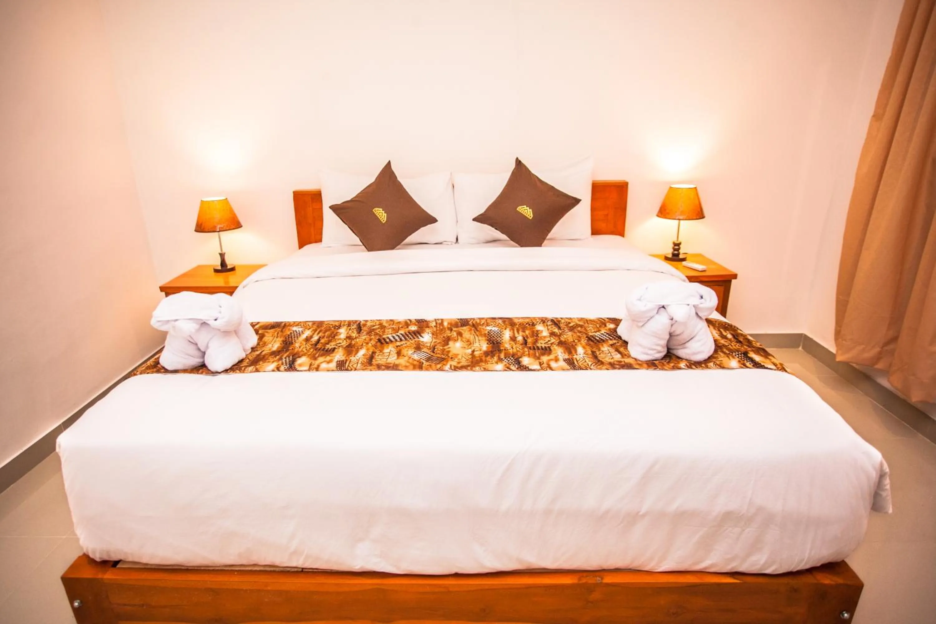 Photo of the whole room, Bed in Singgahan Bungalow by ecommerceloka