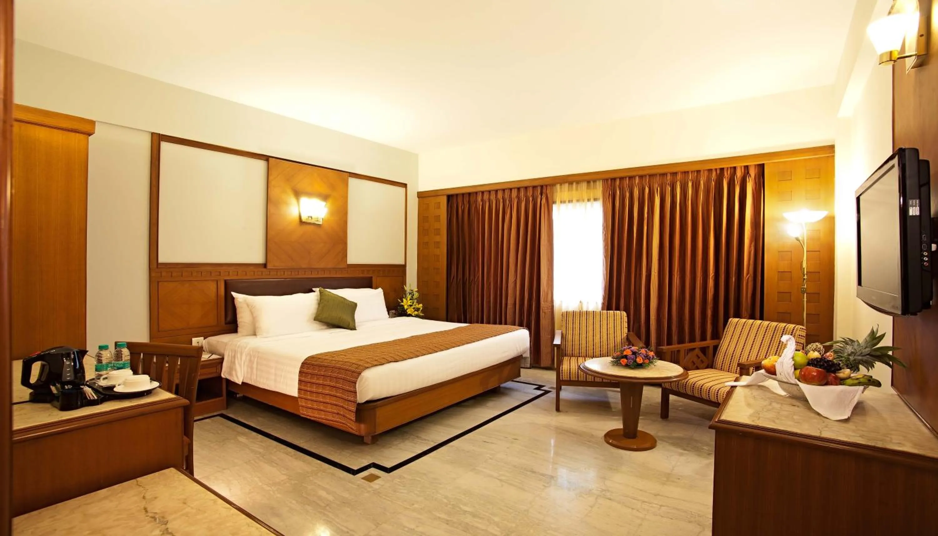 Photo of the whole room, Bed in JP Chennai Hotel