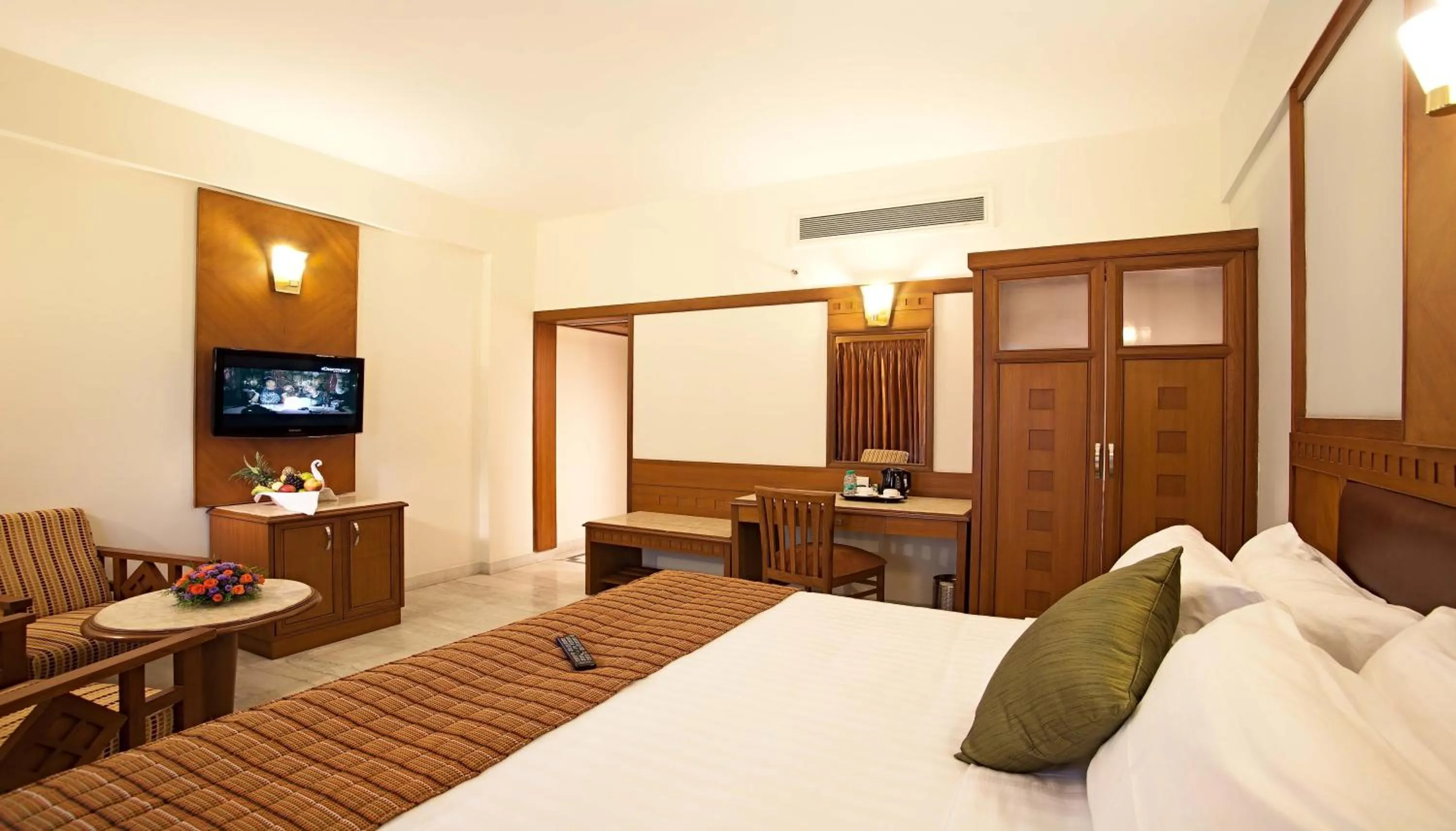 Photo of the whole room, Bed in JP Chennai Hotel