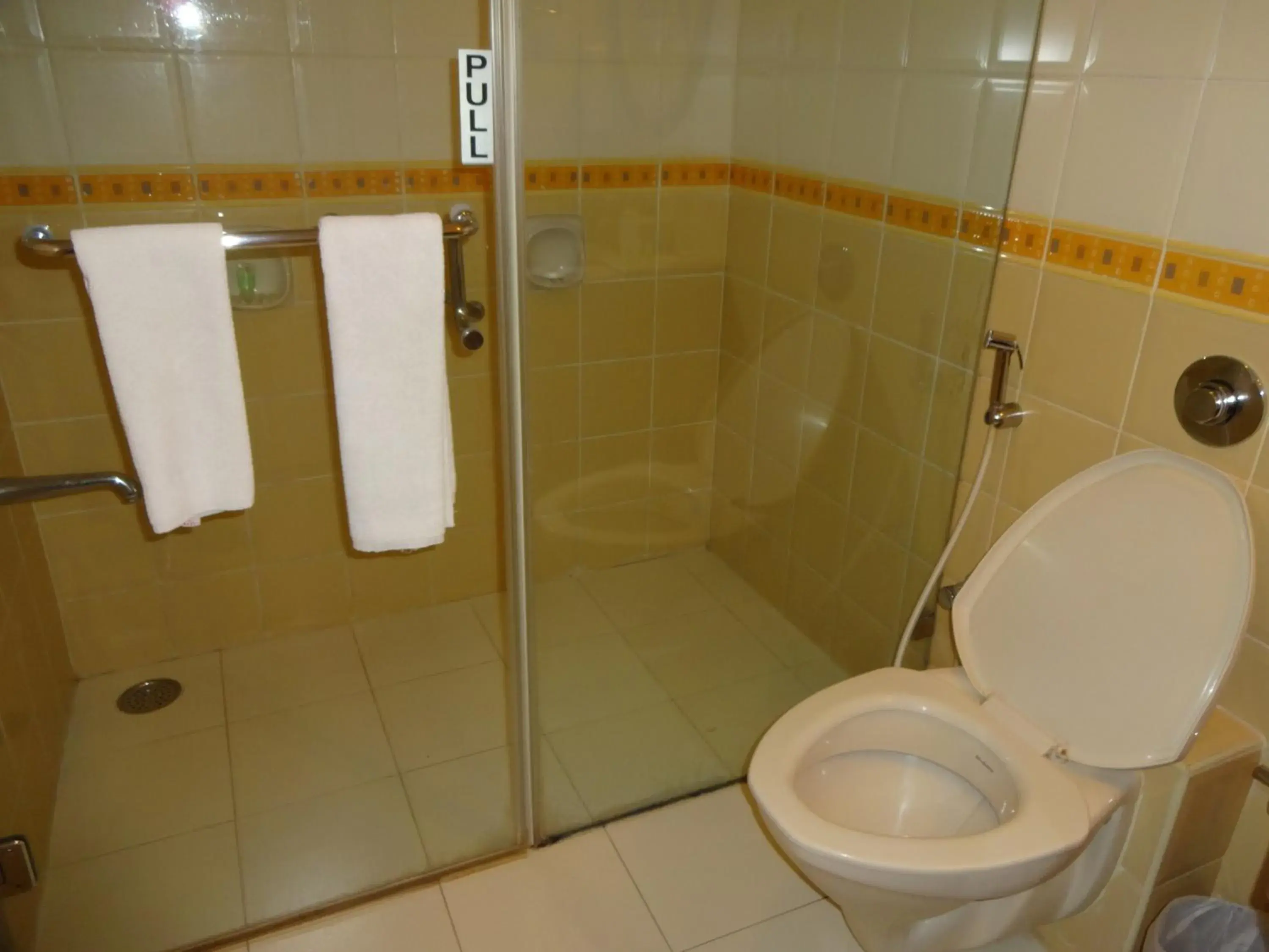 Bathroom in JP Chennai Hotel Bathroom in JP Chennai Hotel