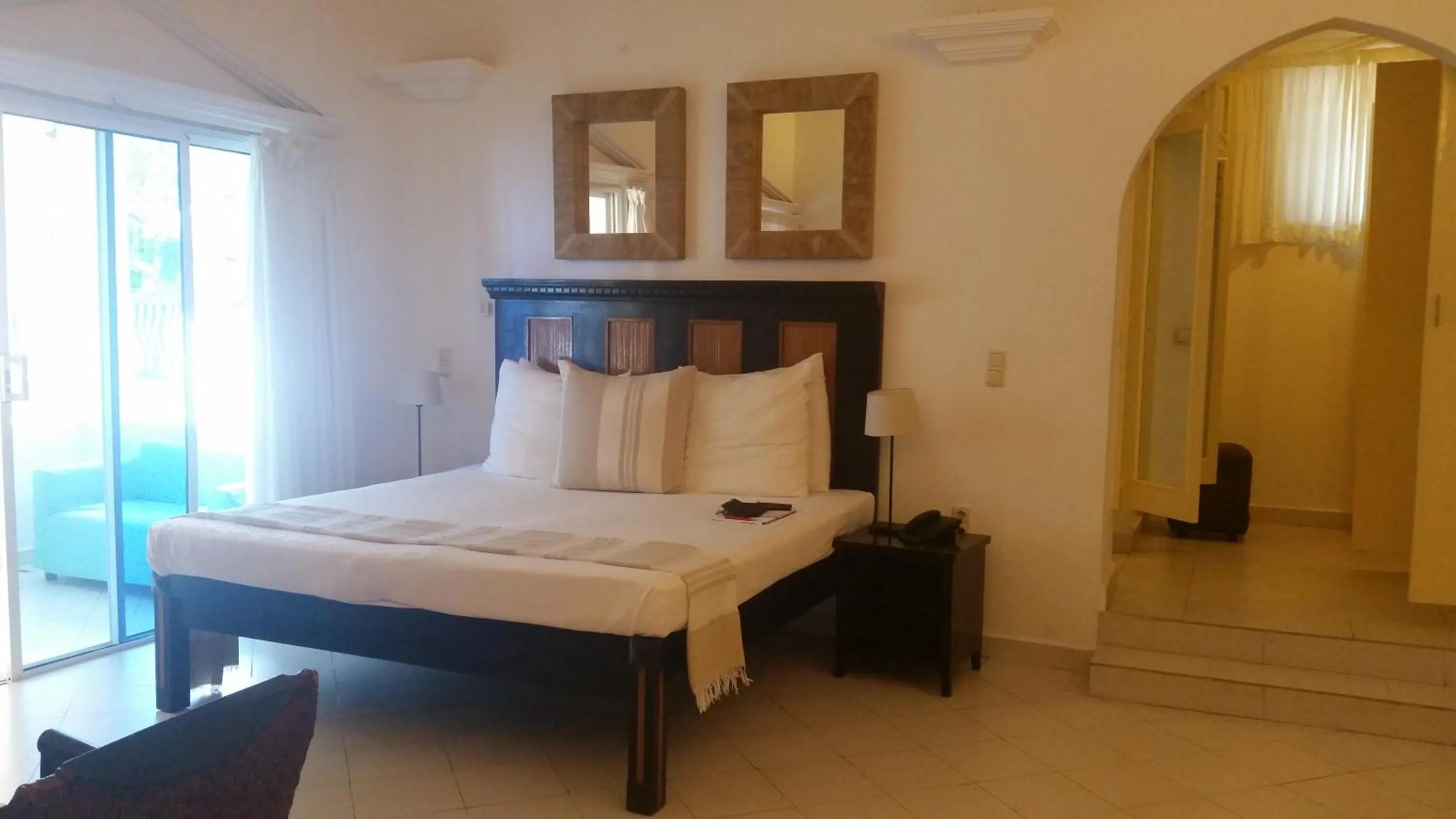 Bed in Coco Ocean Resort & Spa