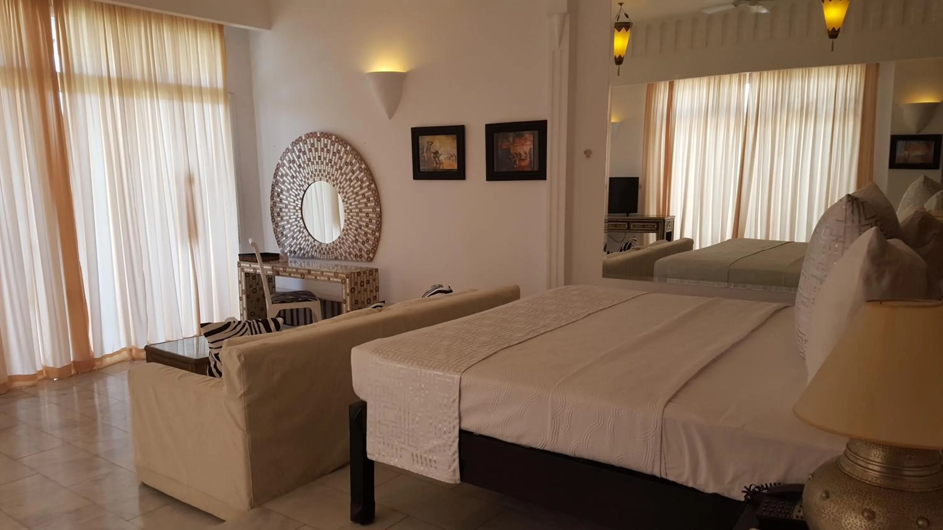 Bed in Coco Ocean Resort & Spa