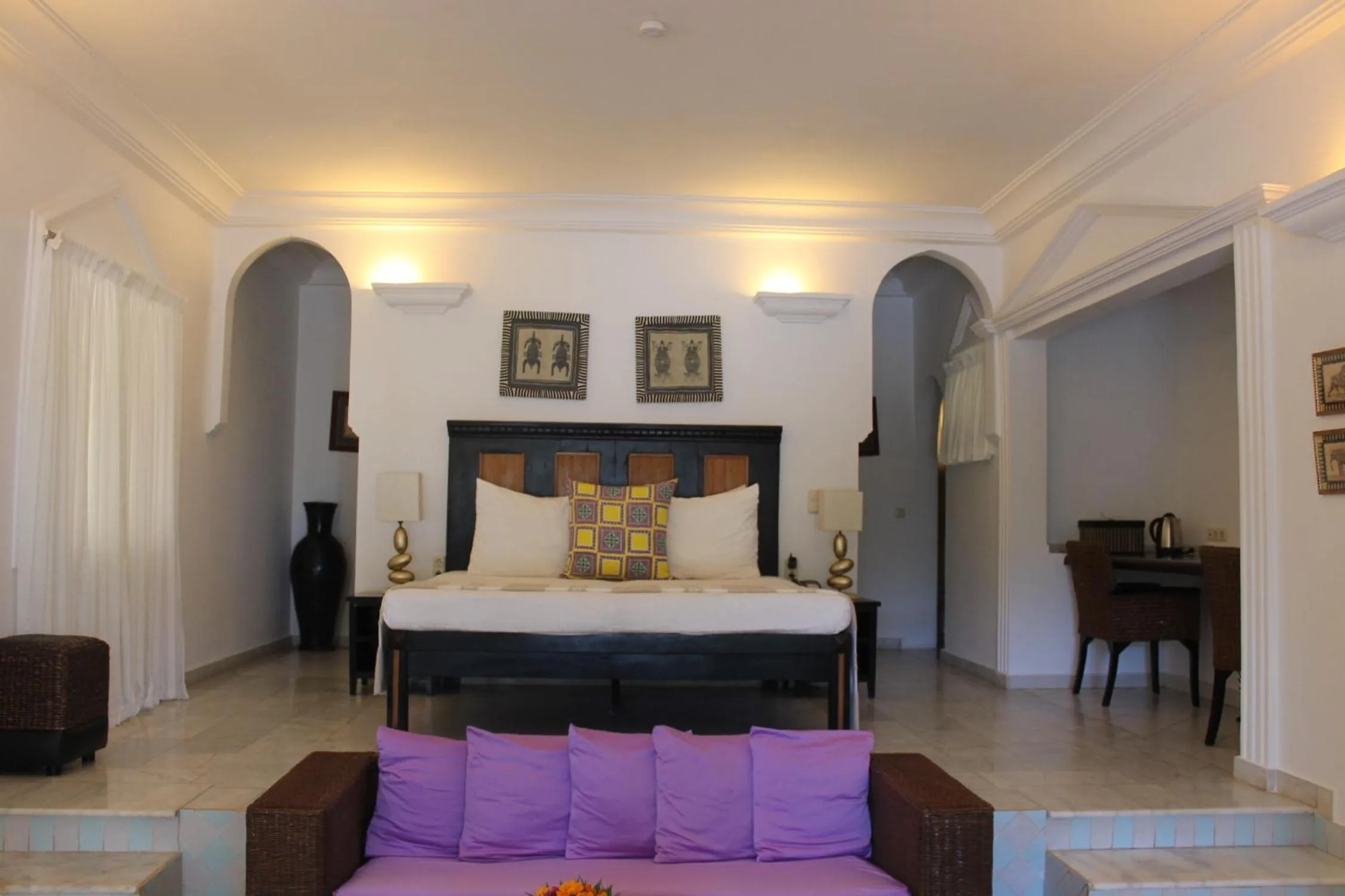 Bed in Coco Ocean Resort & Spa